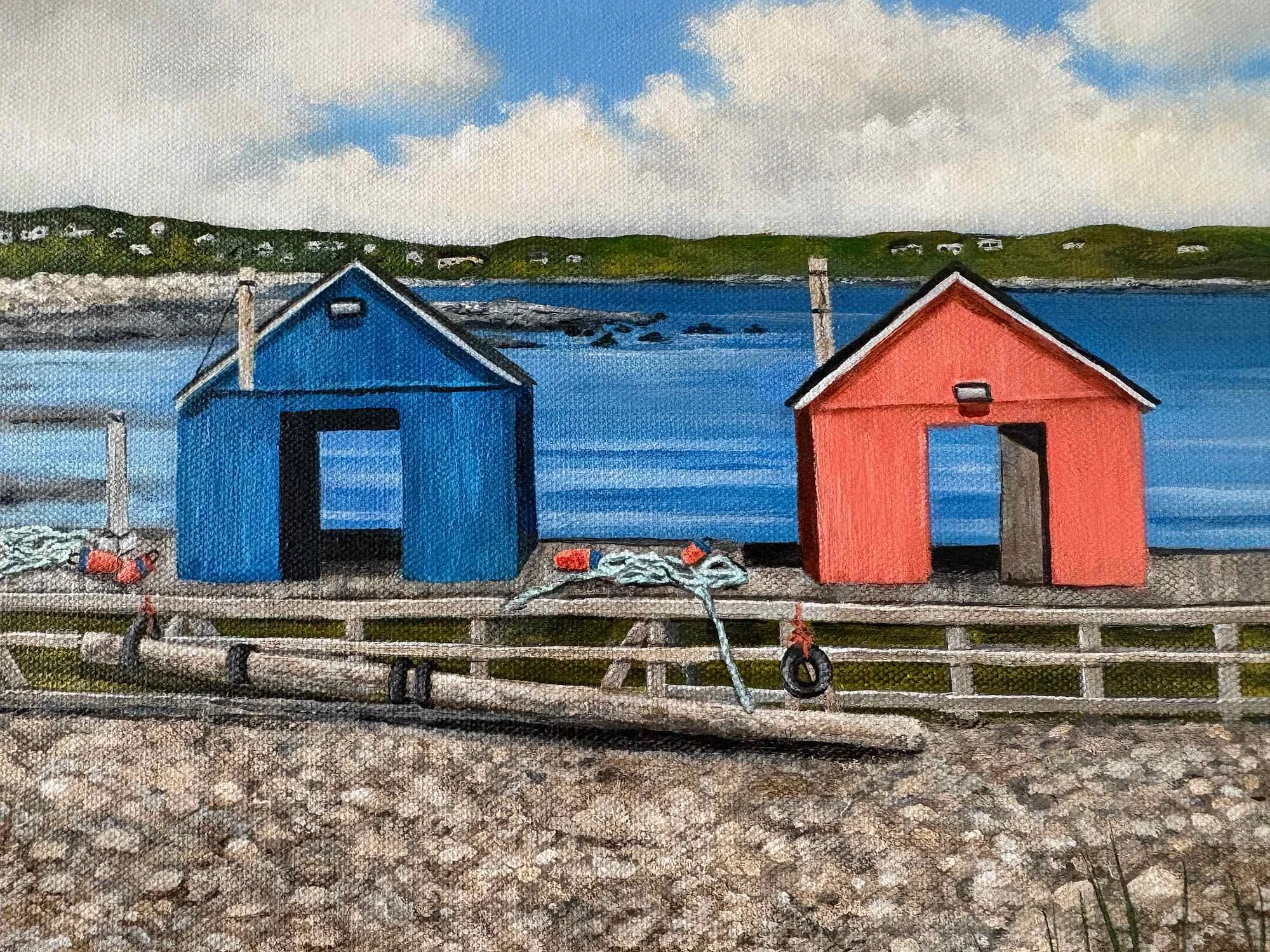 a close up to two lobster cars hauled up at low tide in John's Cove, Yarmouth Bar