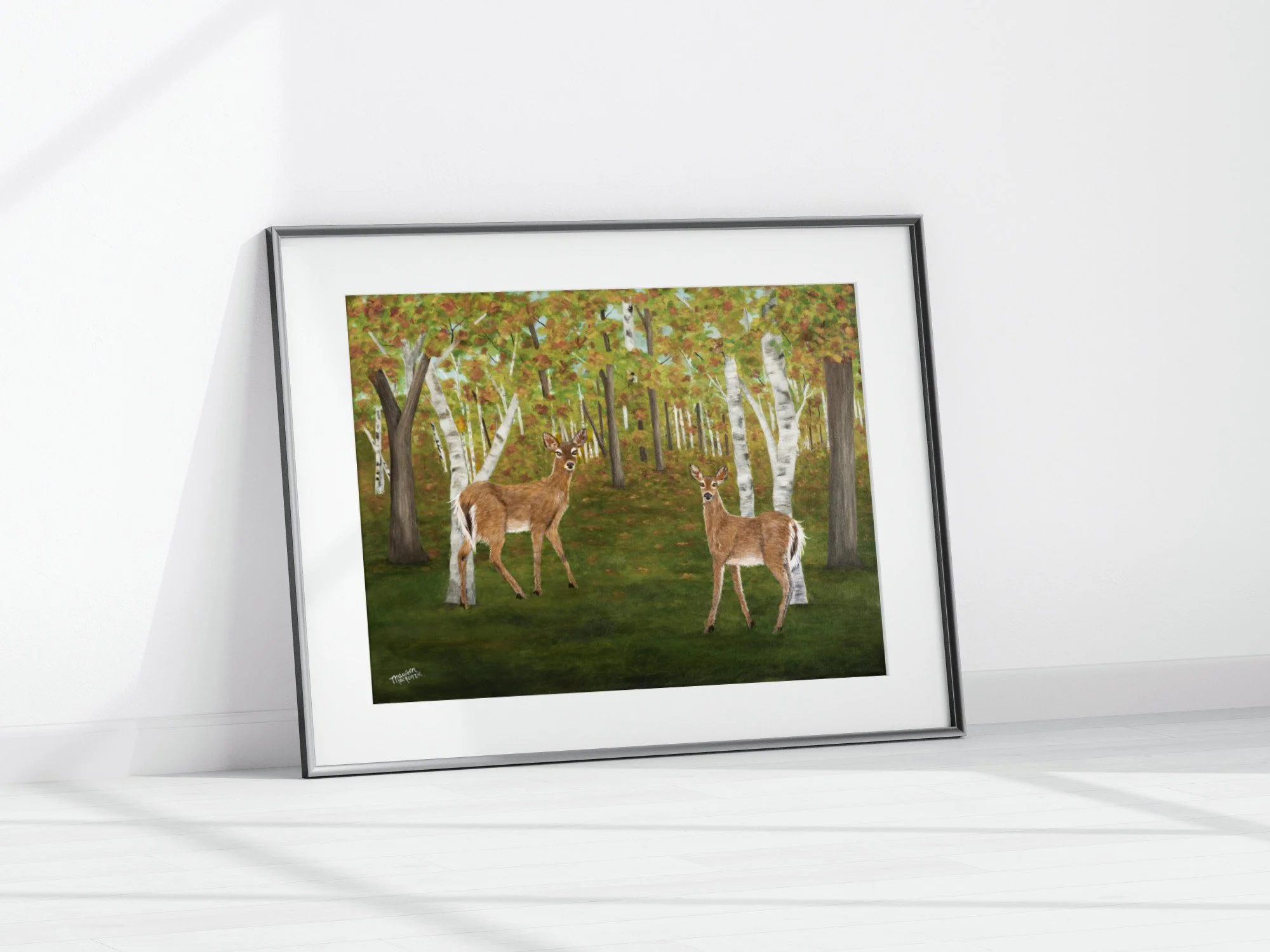 Autumn painting of two whitetail deer standing in a birch forest with golden fall leaves and green woodland floor, inspired by Nova Scotia nature.