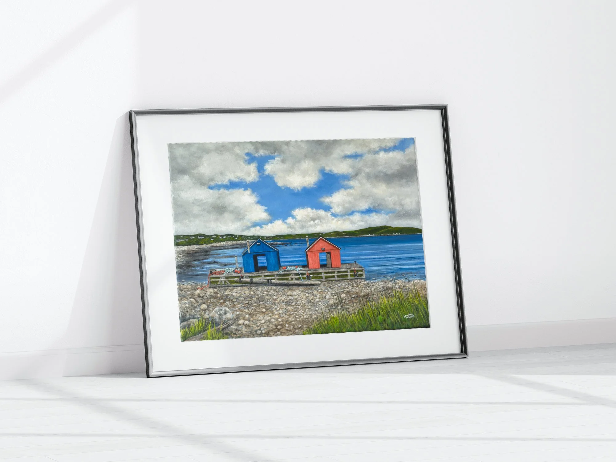 A print by Maureen MacKenzie of two colorful lobster cars on a rocky shore at low tide in John’s Cove, Yarmouth Bar Nova Scotia, with blue ocean water and a dramatic cloudy sky.