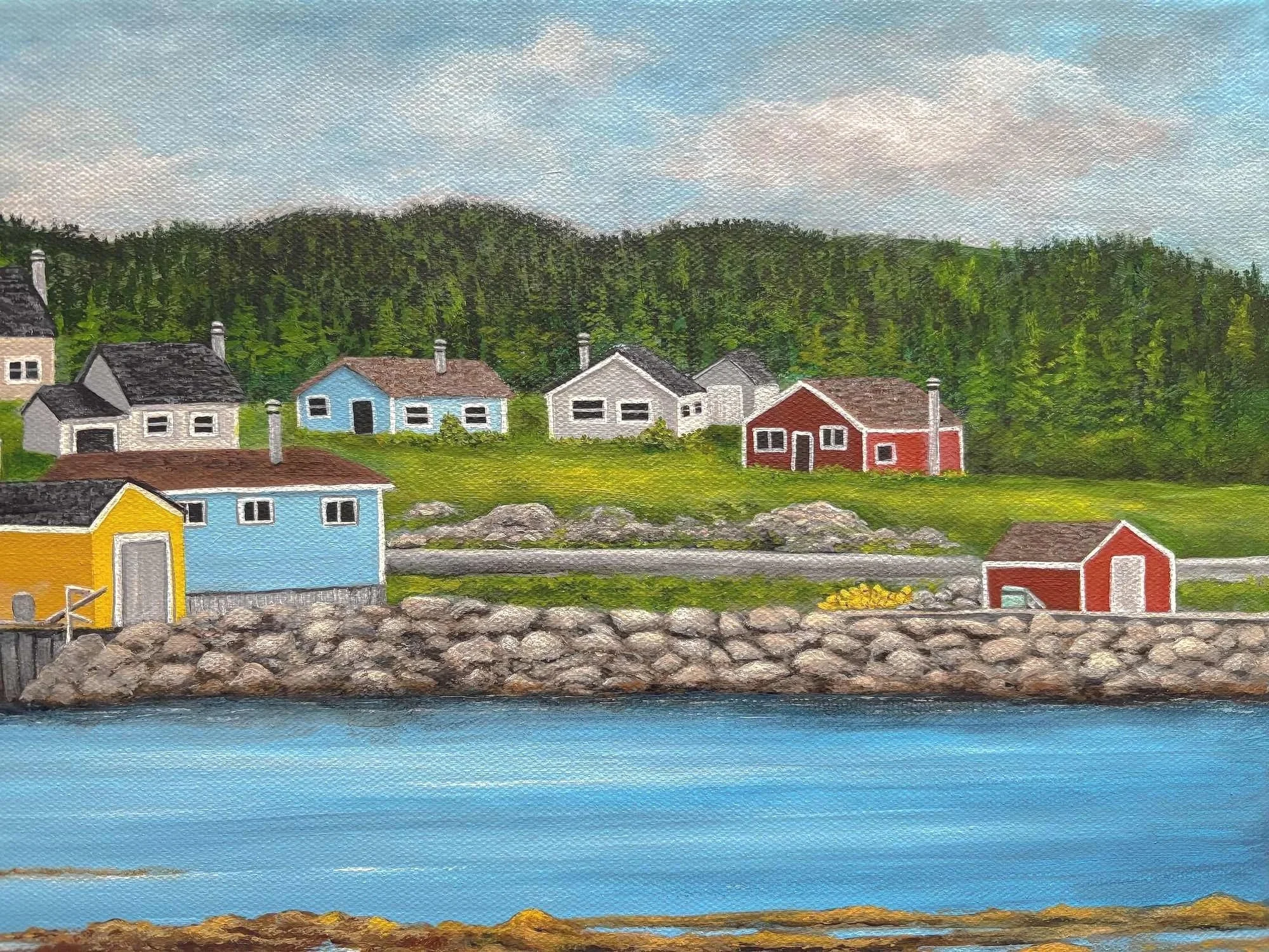 A print by Maureen MacKenzie featuring a colourful coastal newfoundland village, calm blue waters, seaweed flowing over rocks and a white fishing skiff moored to an orange fishing buoy..