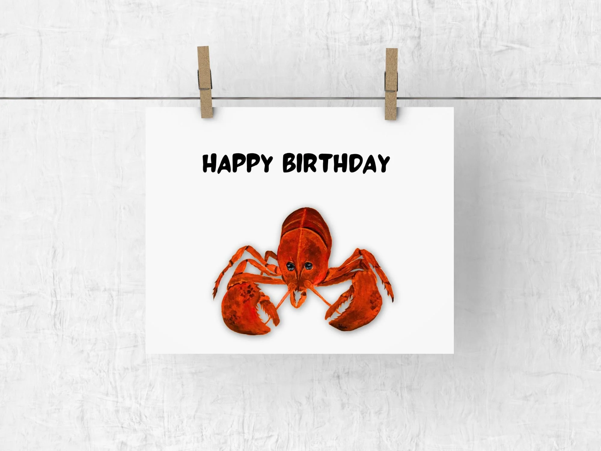 Lobster birthday card featuring a bright red lobster from an original acrylic painting by Nova Scotia artist Maureen MacKenzie, with Happy Birthday text above on a white card.