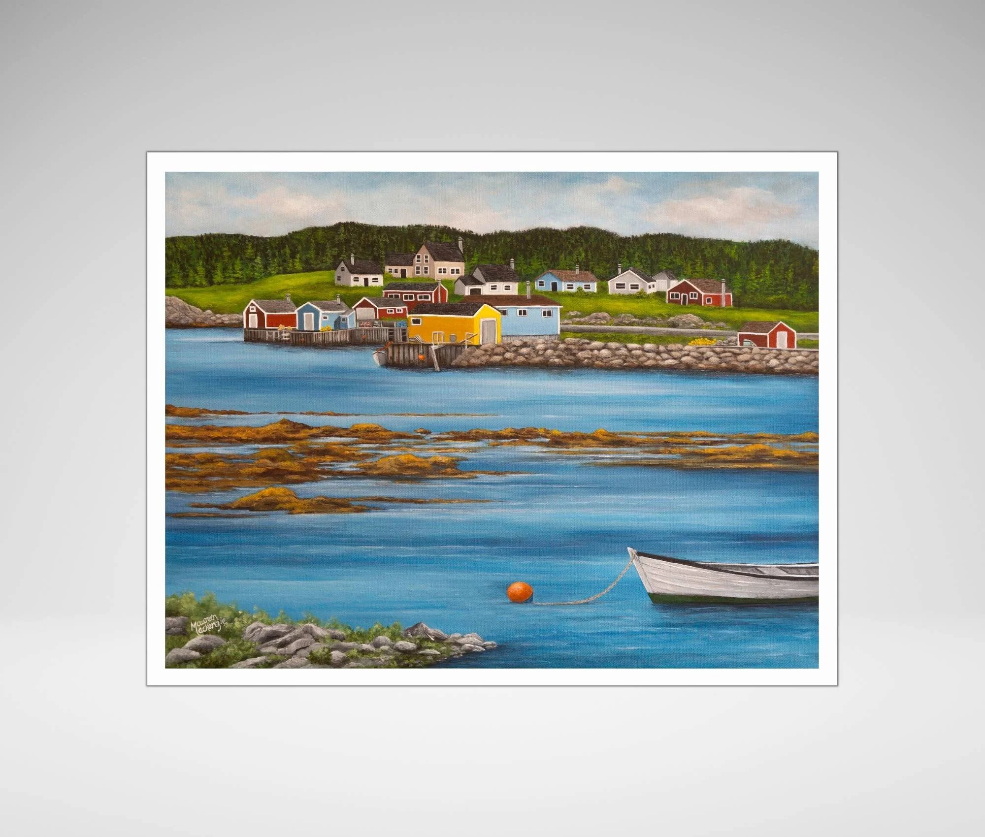 A print by Maureen MacKenzie featuring a colourful coastal newfoundland village, calm blue waters, seaweed flowing over rocks and a white fishing skiff moored to an orange fishing buoy..