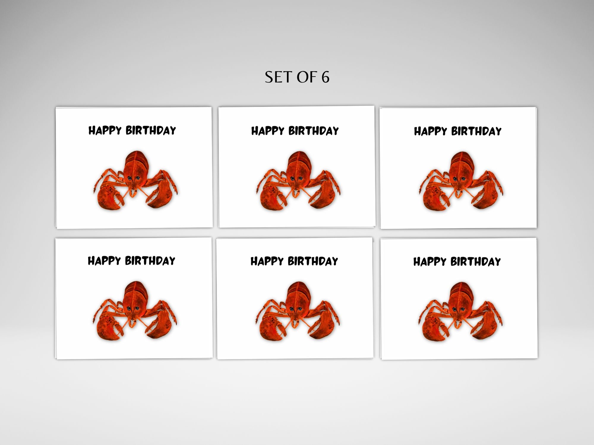 set of 6 Lobster birthday card featuring a bright red lobster from an original acrylic painting by Nova Scotia artist Maureen MacKenzie, with Happy Birthday text above on a white card.
