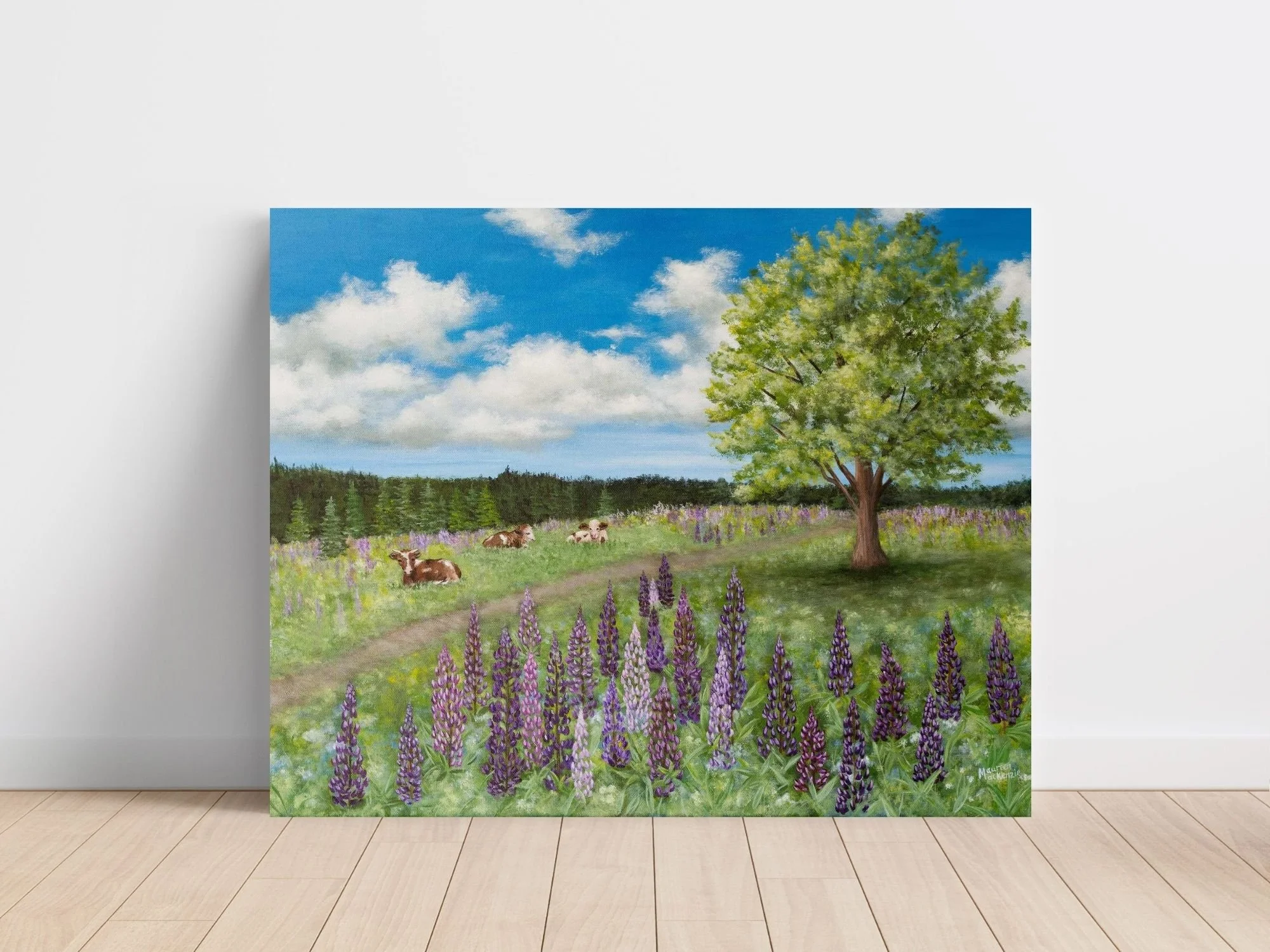 Original acrylic landscape painting featuring three brown and white cows resting in a green grass field with purple and pink lupine flowers in the foreground under a bright blue sky with white clouds.