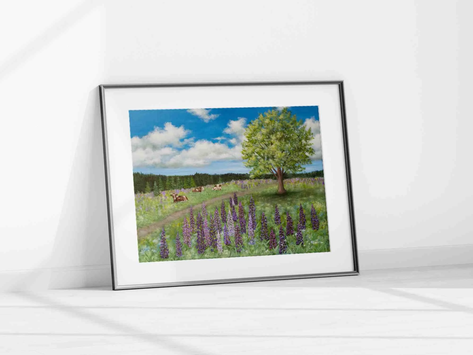 Fine art print of an original painting showing cows resting in a peaceful summer pasture surrounded by blooming purple lupines beneath a large shade tree and bright blue sky.