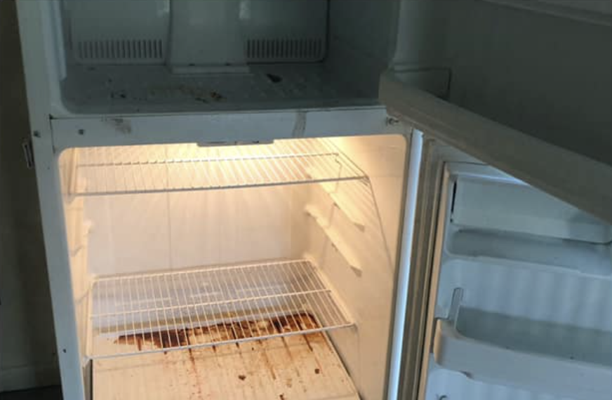 Before photo of dirty refrigerator for move-out cleaning