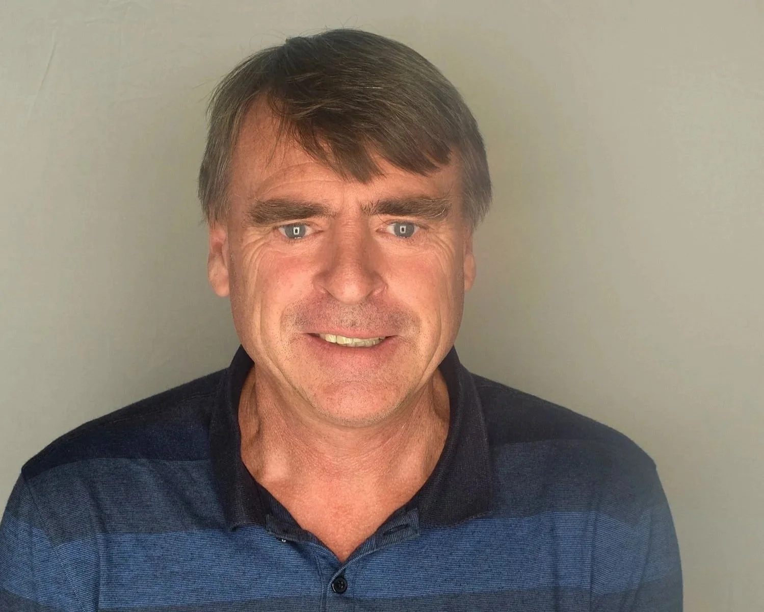 Paul Kempster smiling at the camera