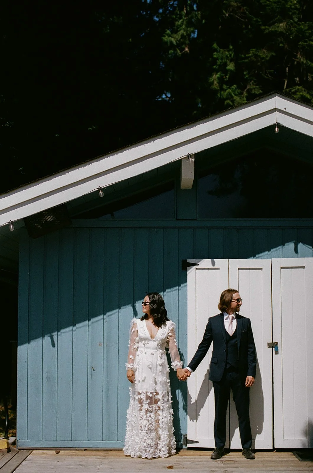 A portrait of a bride and groom on their wedding on the Sunshine Coast. Film photography by Sea to Sky Studios.