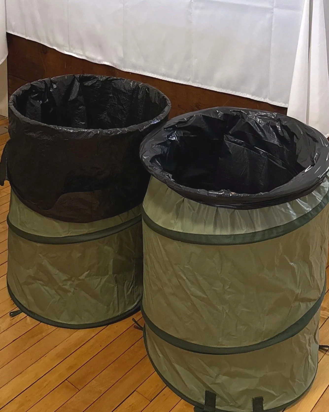 Included- garbage containers, bags