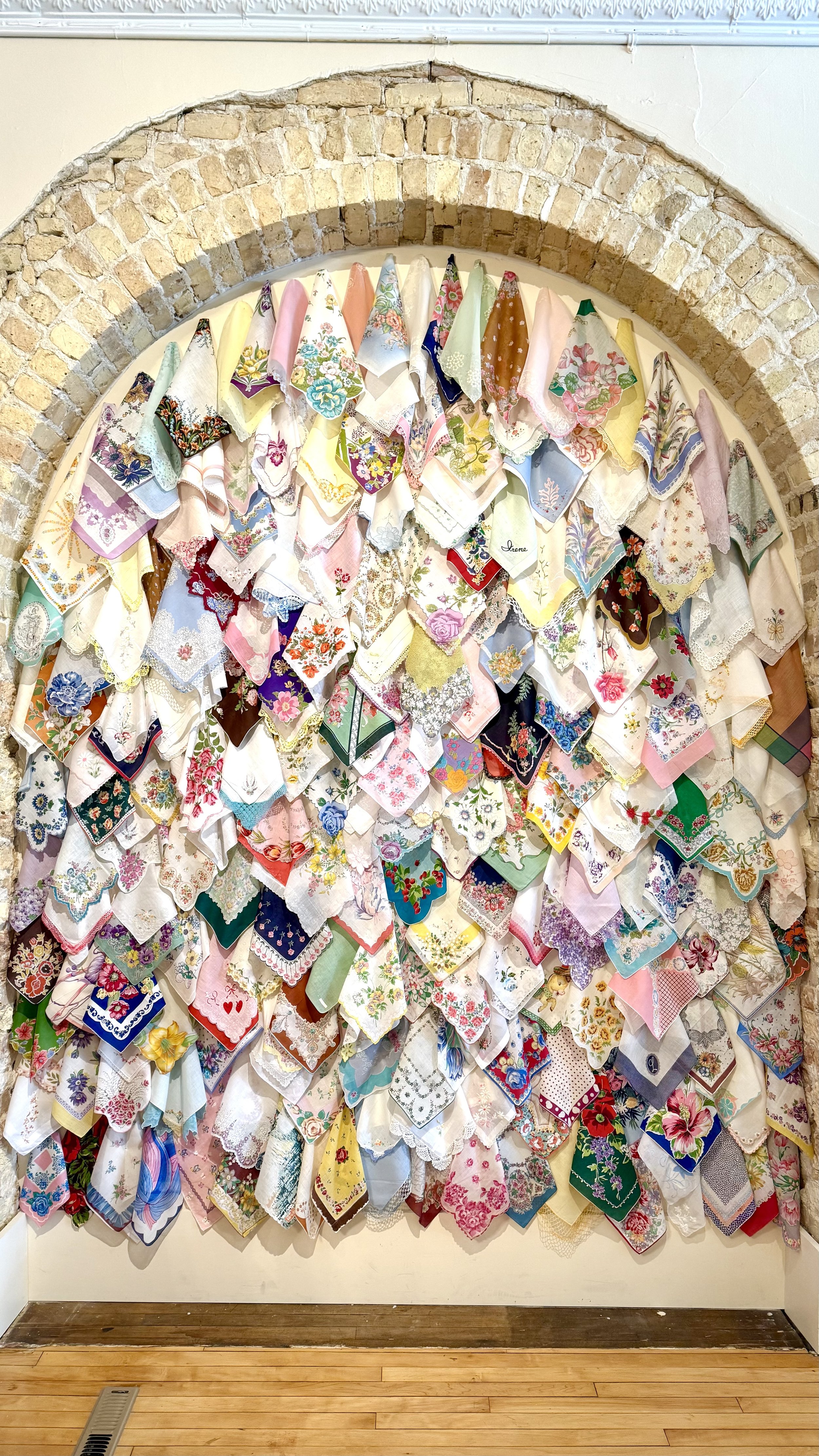 Antique and Vintage Handkerchiefs fill the enclosed archway in the Hall (1st floor)
