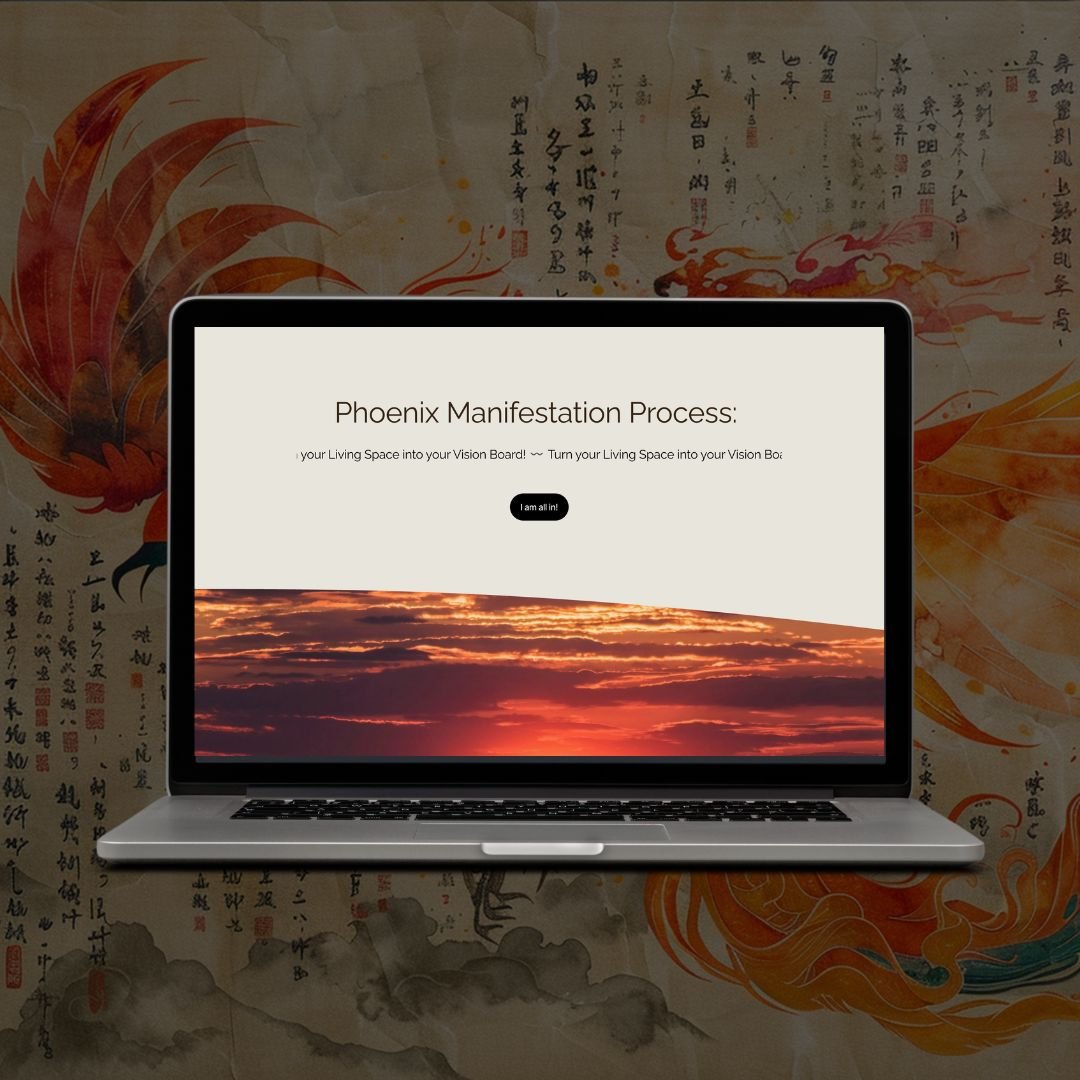 Laptop displaying a presentation titled "Phoenix Manifestation Process" with a sunset background on the screen. The laptop is placed in front of traditional Asian art and calligraphy on a wall.
