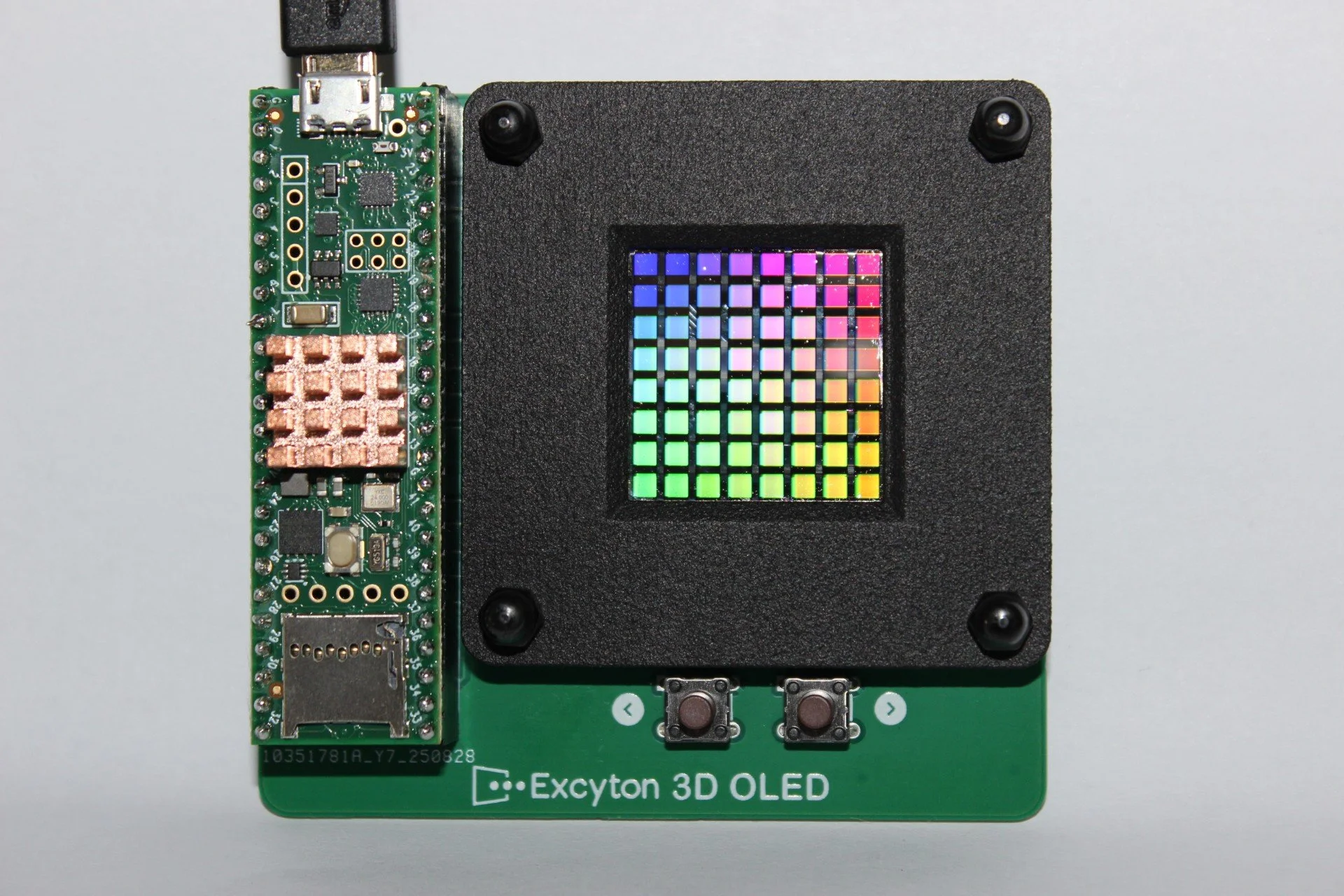 Prototype 3D-OLED passive-matrix display rendering a multicolour spiral, demonstrating full-colour output from vertically stacked RGB sub-pixels.