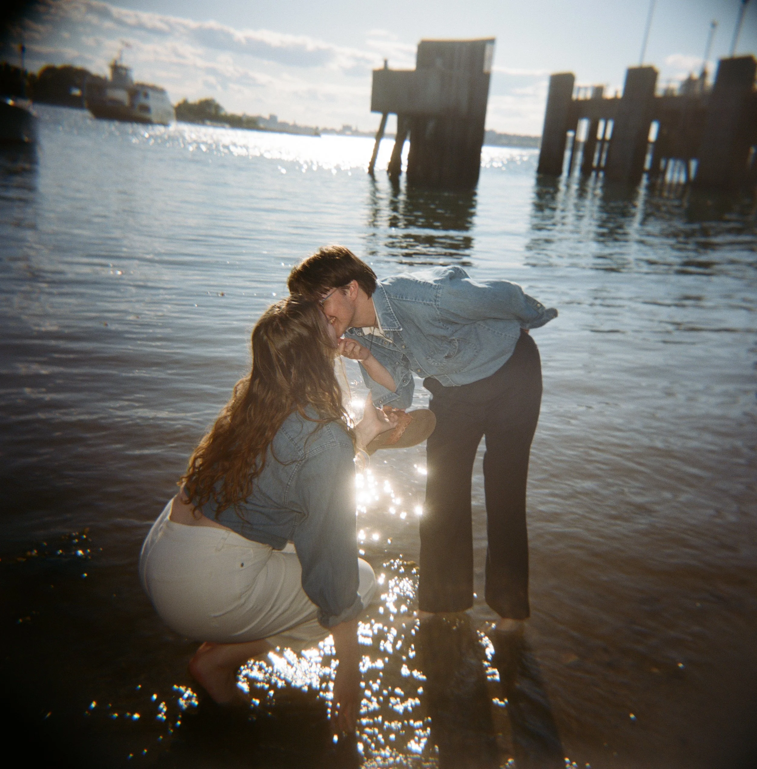 a couple kissing on film in portland