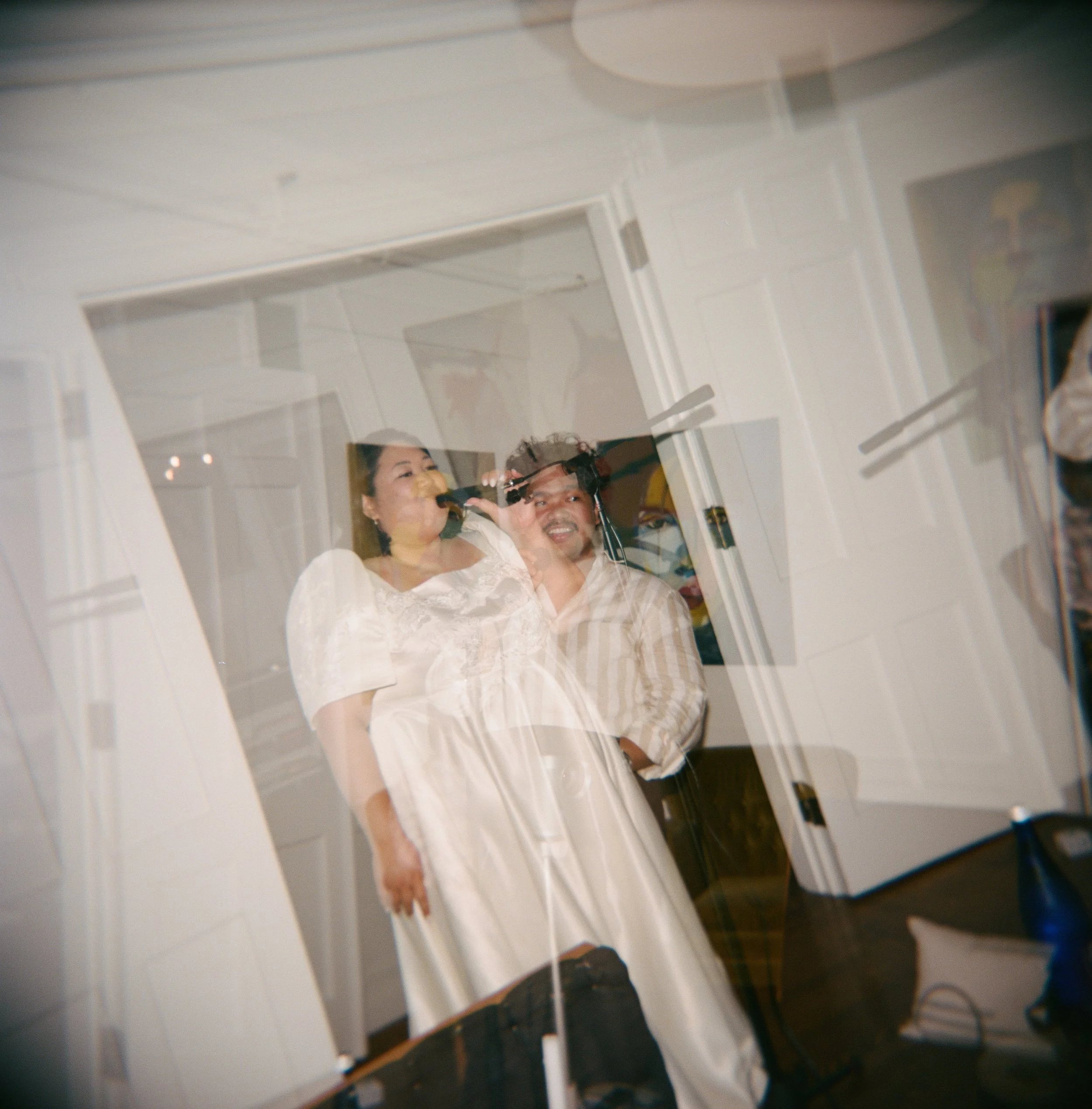 couple singing karoake at wedding reception fun double exposure in portland on film