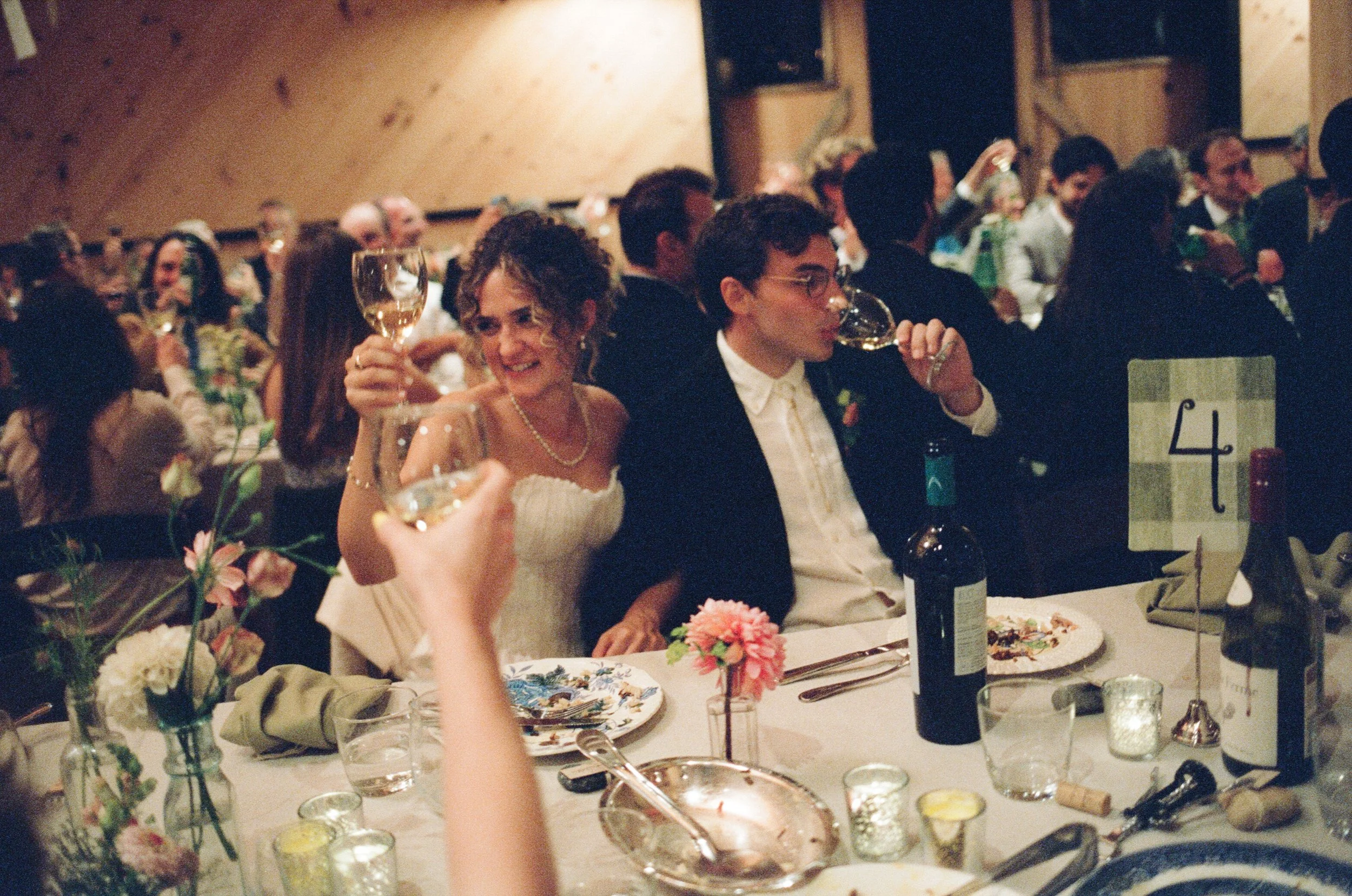 dinner at a barn wedding in downeast maine on film