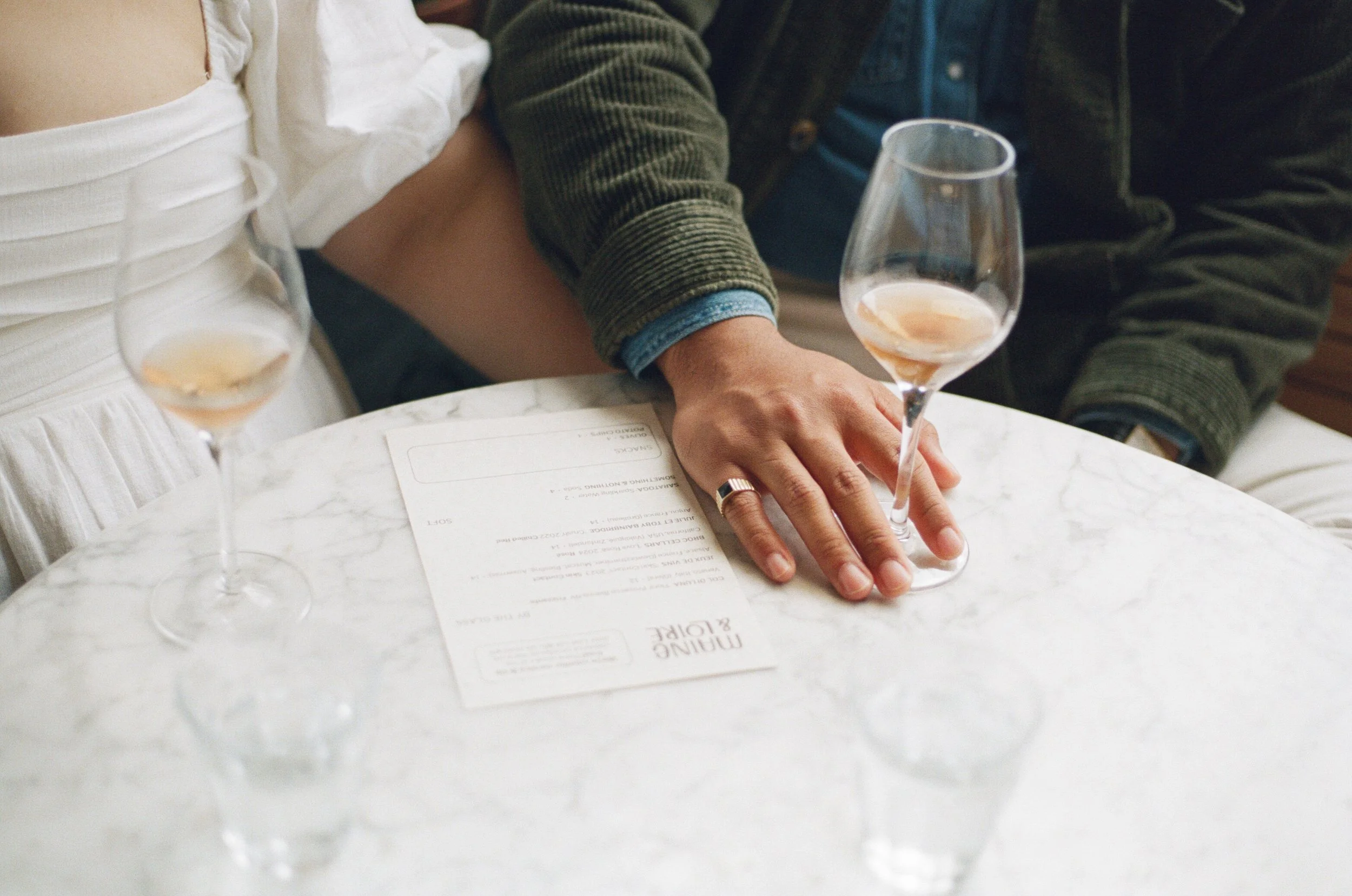 couple sitting at maine and loire during engagement session