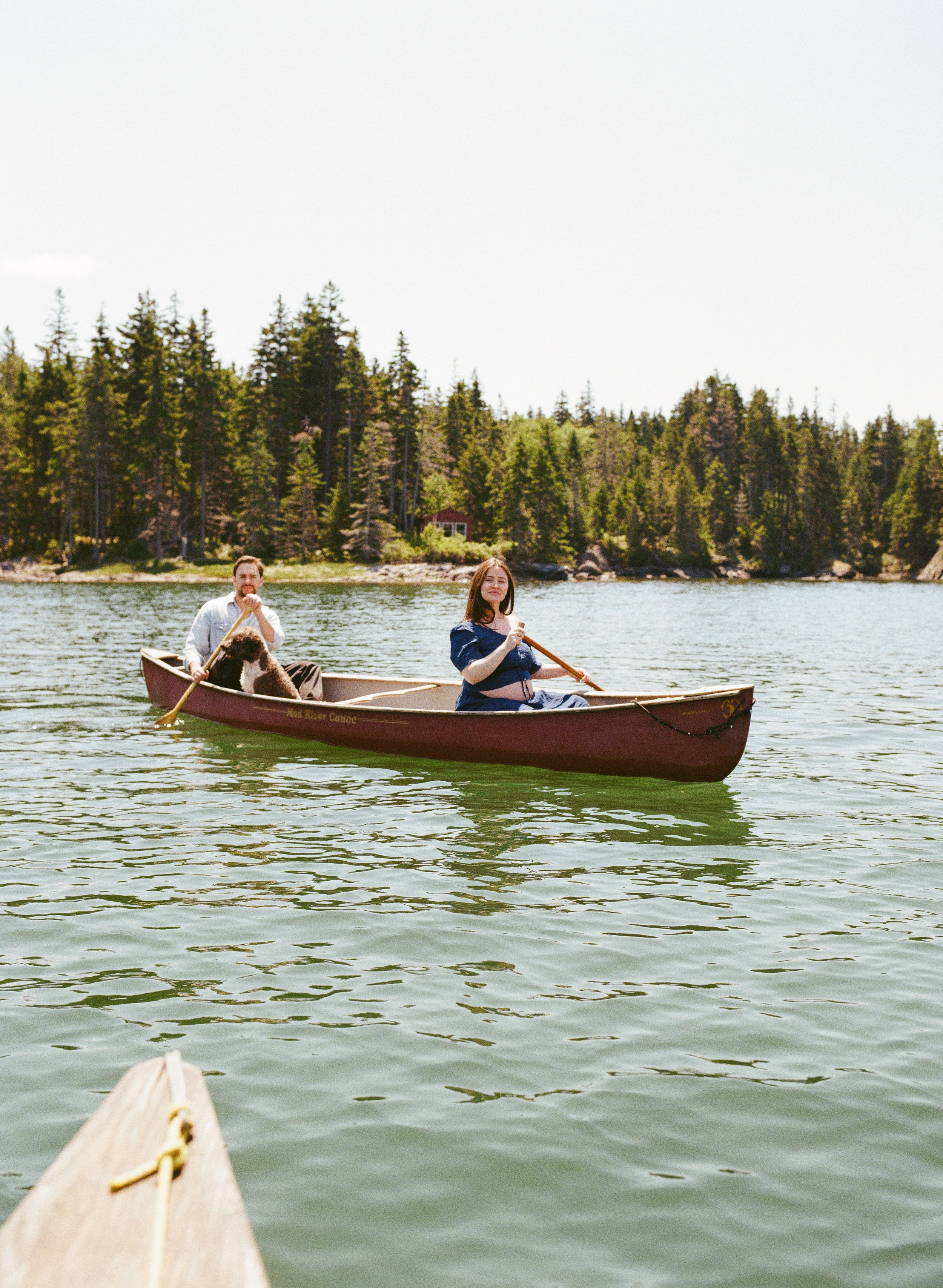 Midcoast Maine family photography session on film on Vinalhaven - maternity shoot kayaking on bay
