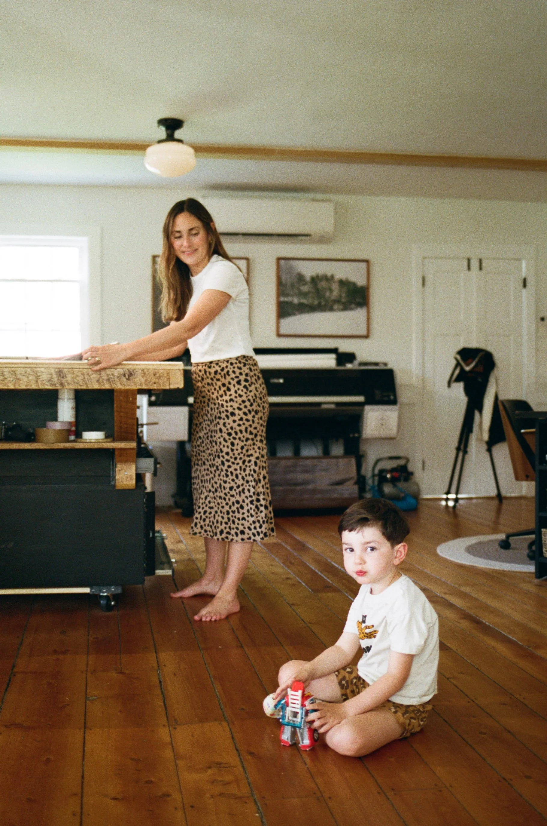 Candid branding photography on analog film at a printing studio in Midcoast Maine