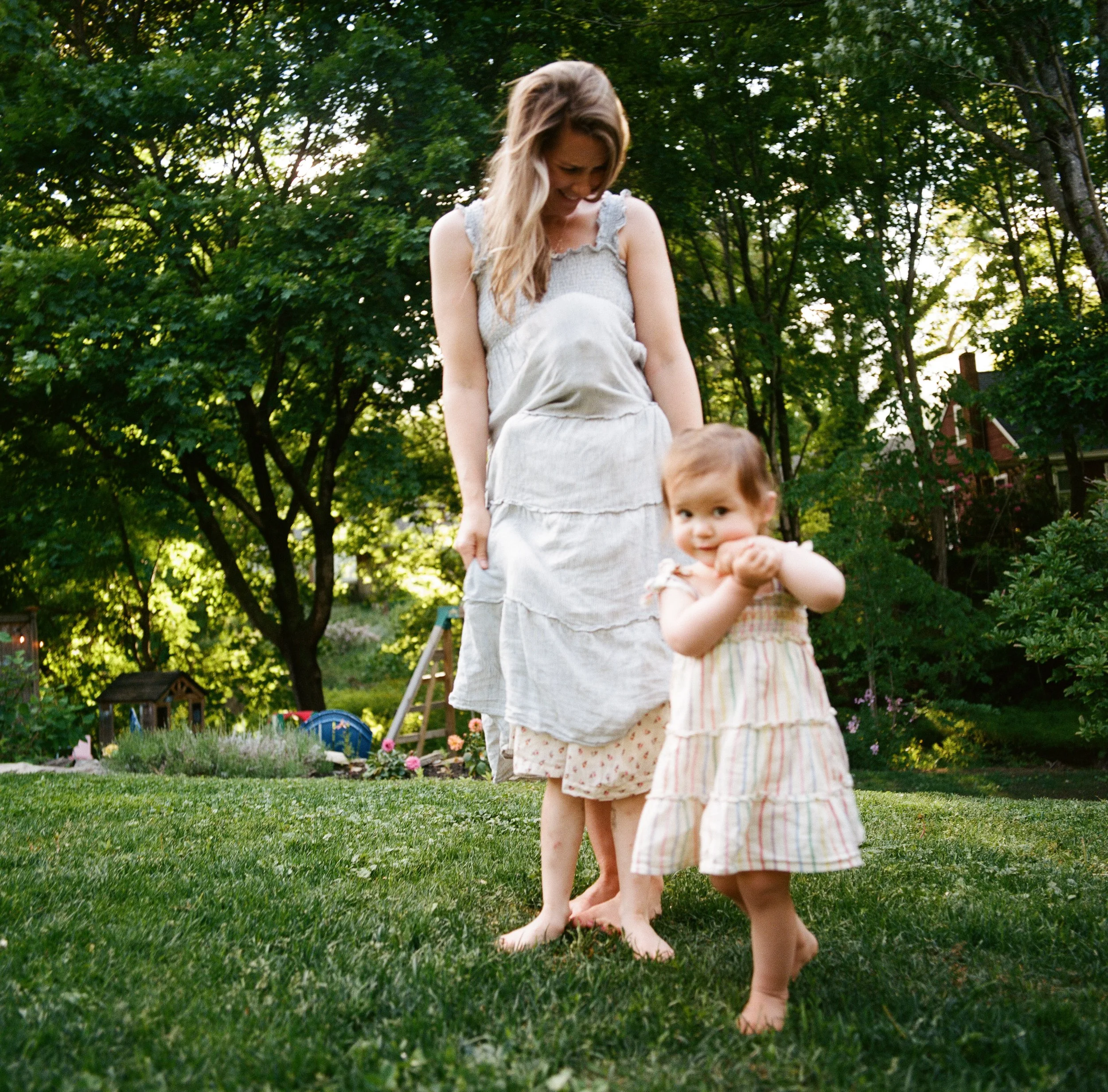 mom and daughters backyard candid photography on film in yarmouth maine