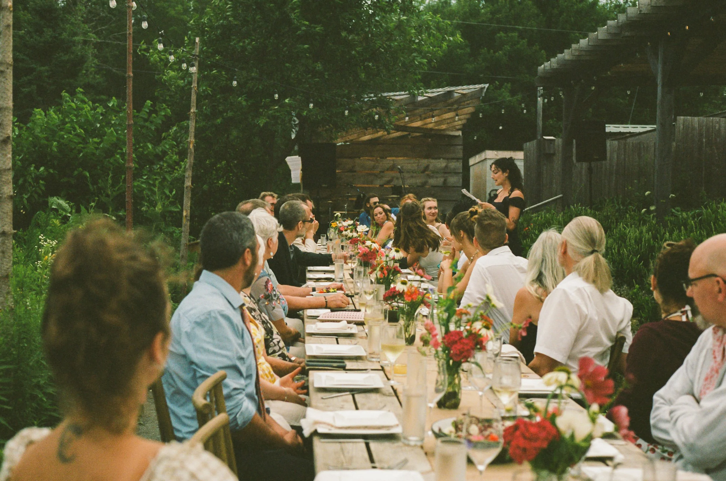 outdoor dinner and speeches at sweet peas in maine