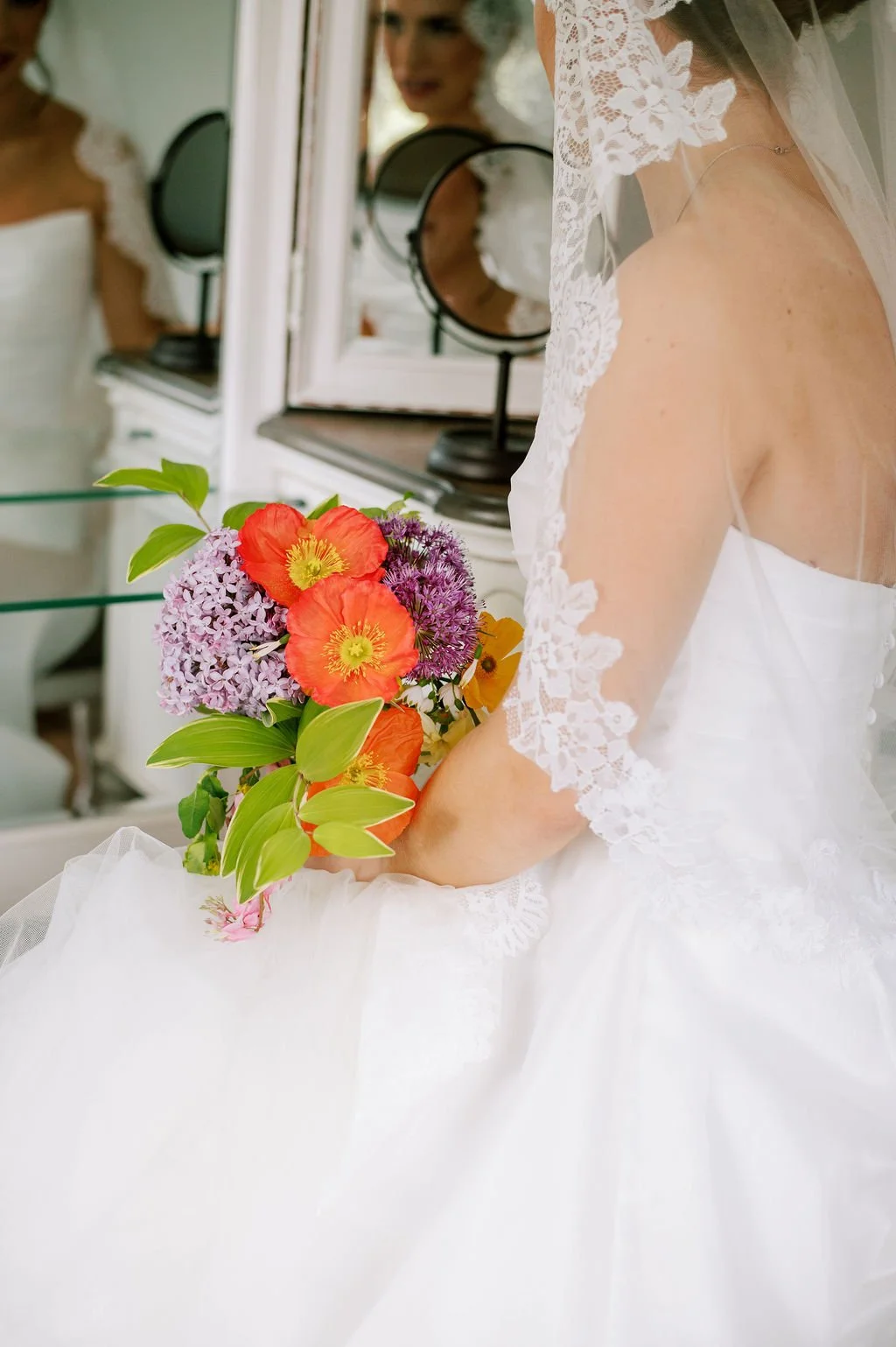 getting ready bridal portraits on film in the bridal suite
