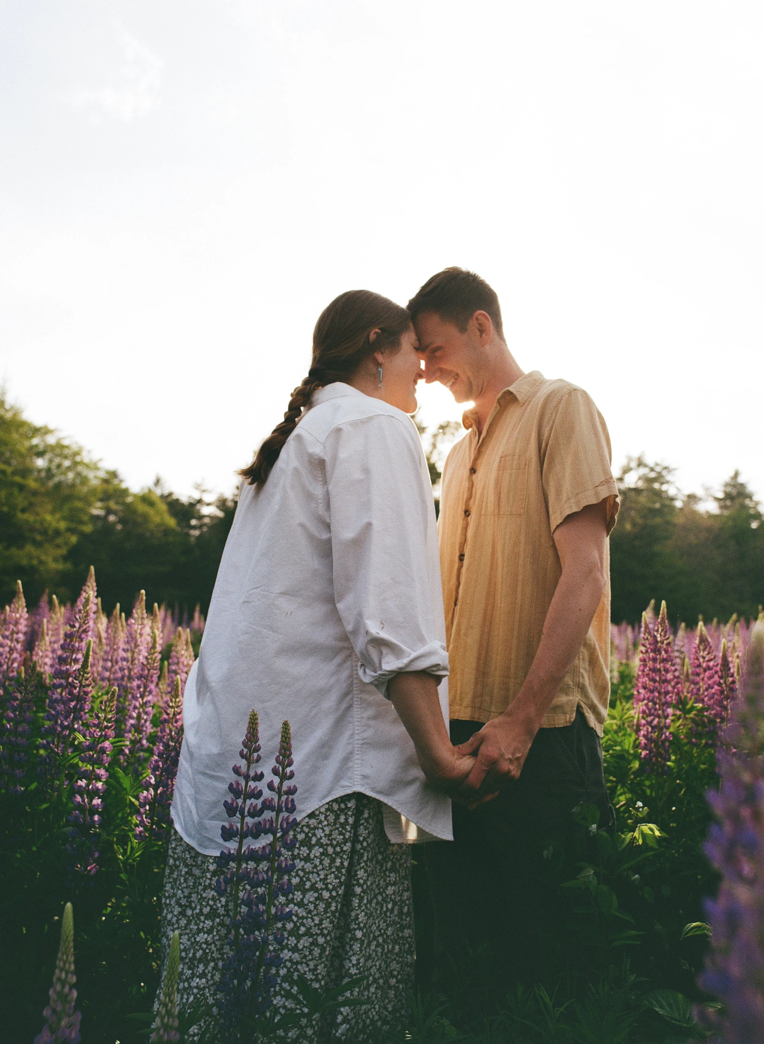 natural portrait of couple at sunset engagement session