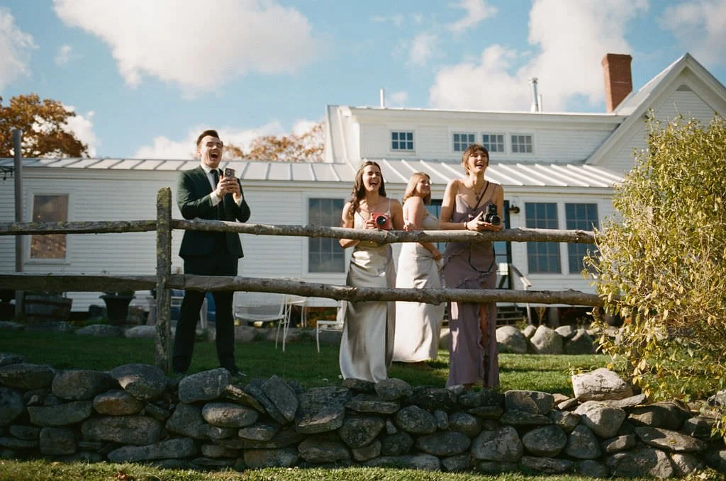 Film photography of wedding at tops'l farm of guests taking photos