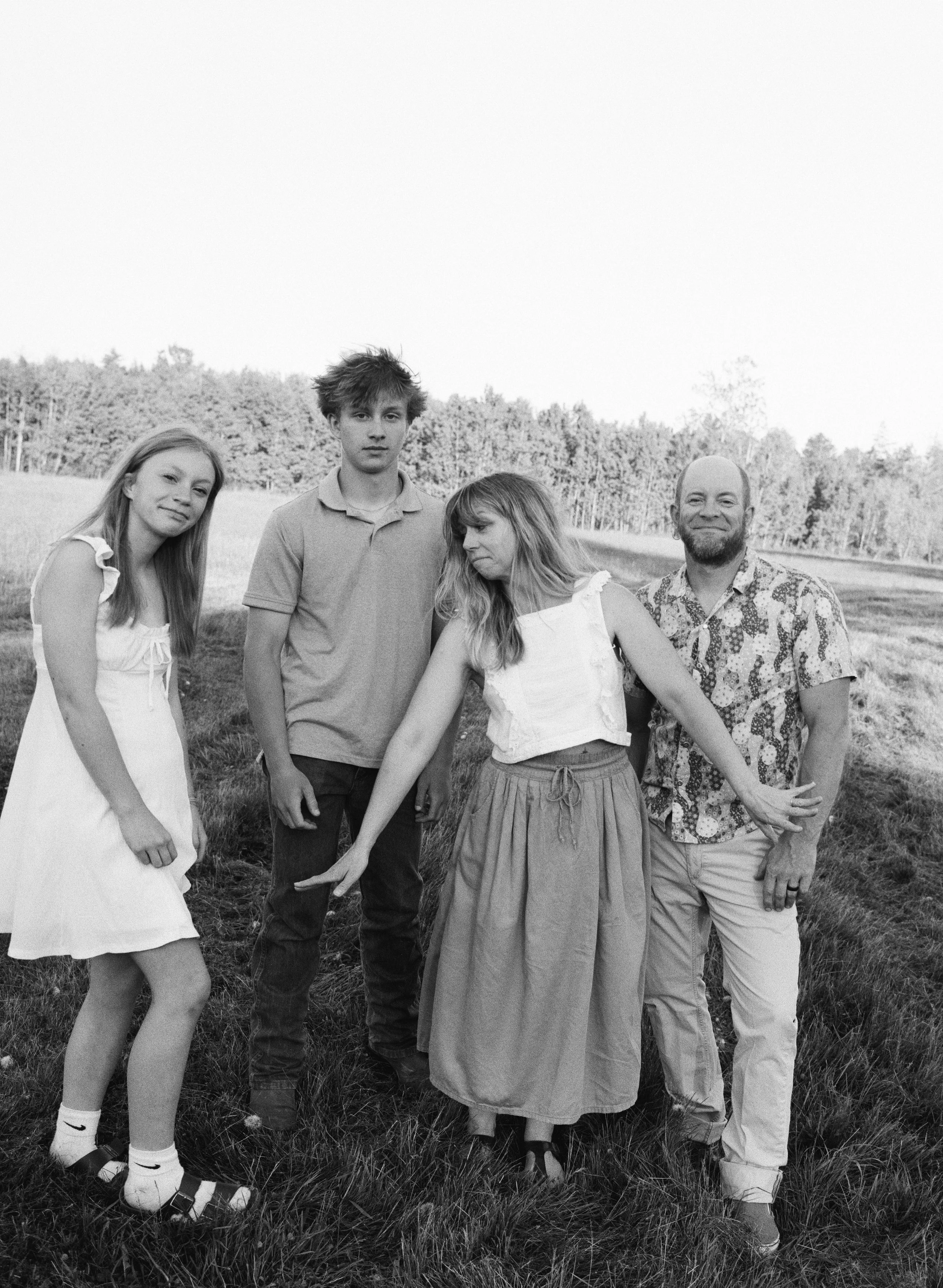 candid of family of 4 at home in maine
