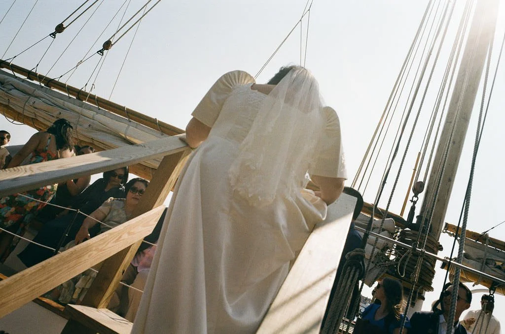 a bride enters a schooner in portland before their wedding