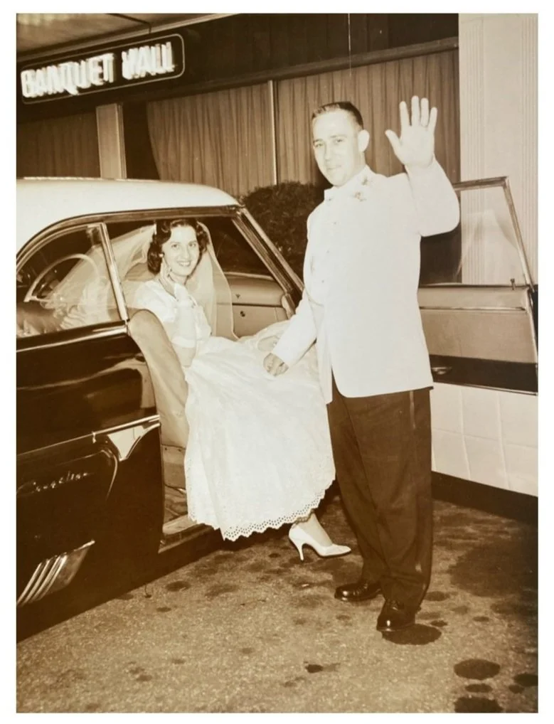 Vintage wedding of a couple getting into an old car after their reception in Massachusetts