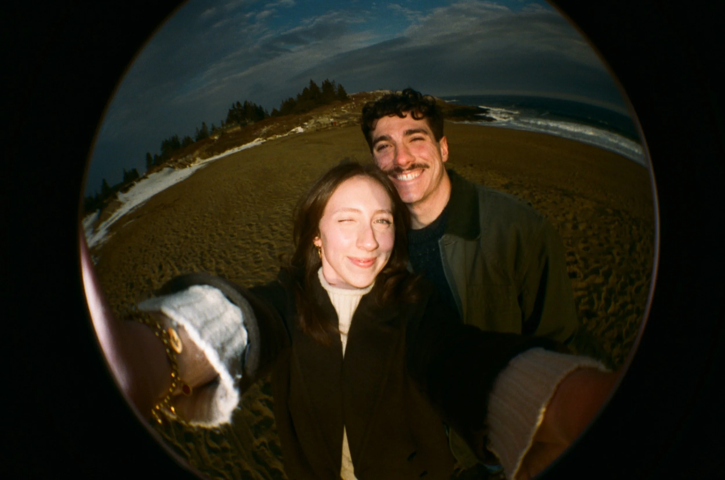 playful couples photography on a lomo fisheye camera in maine
