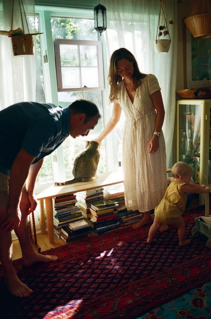 documentary, playful family session at home with cat and toddler