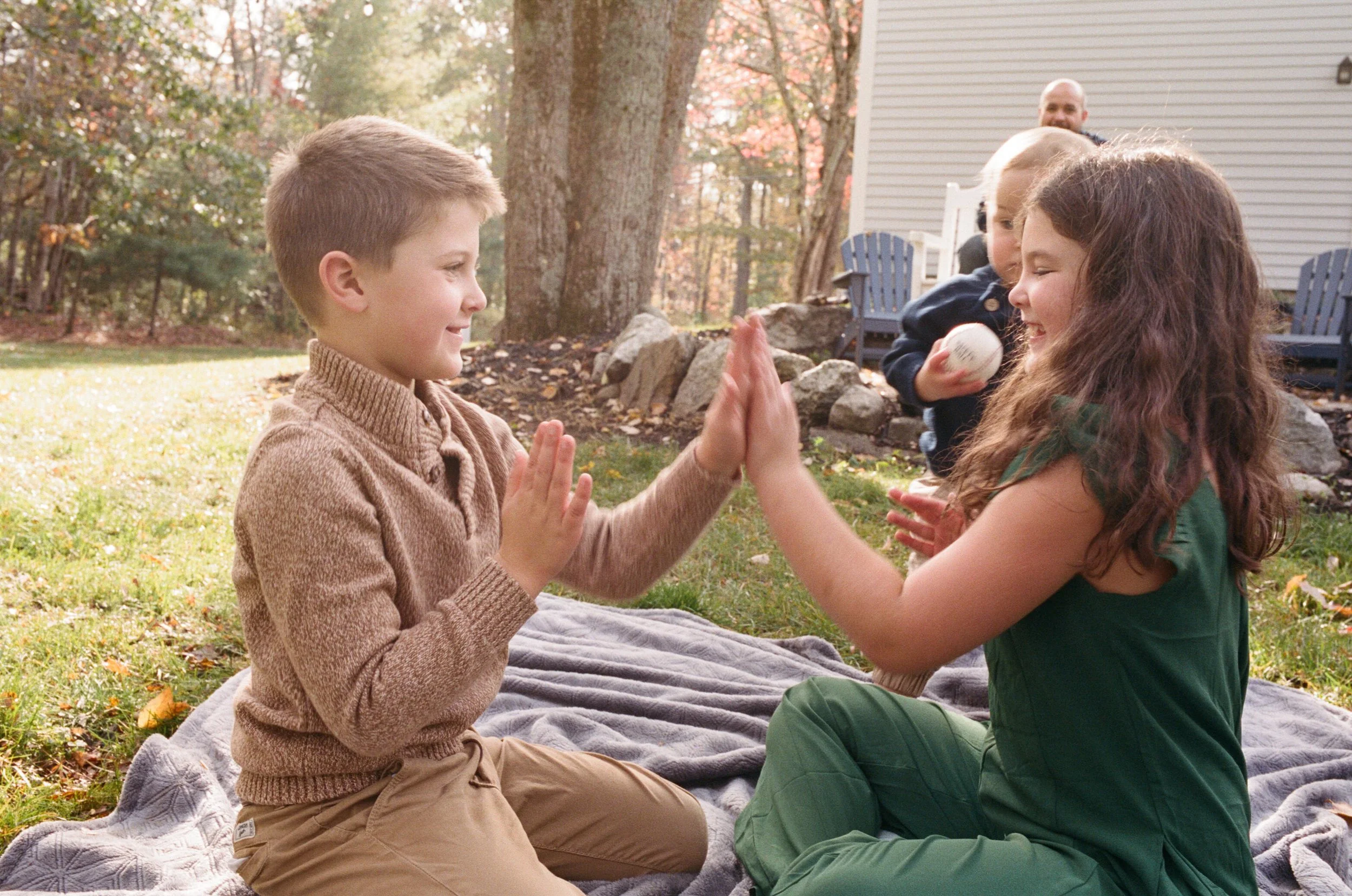 Kids playing in their backyard on film