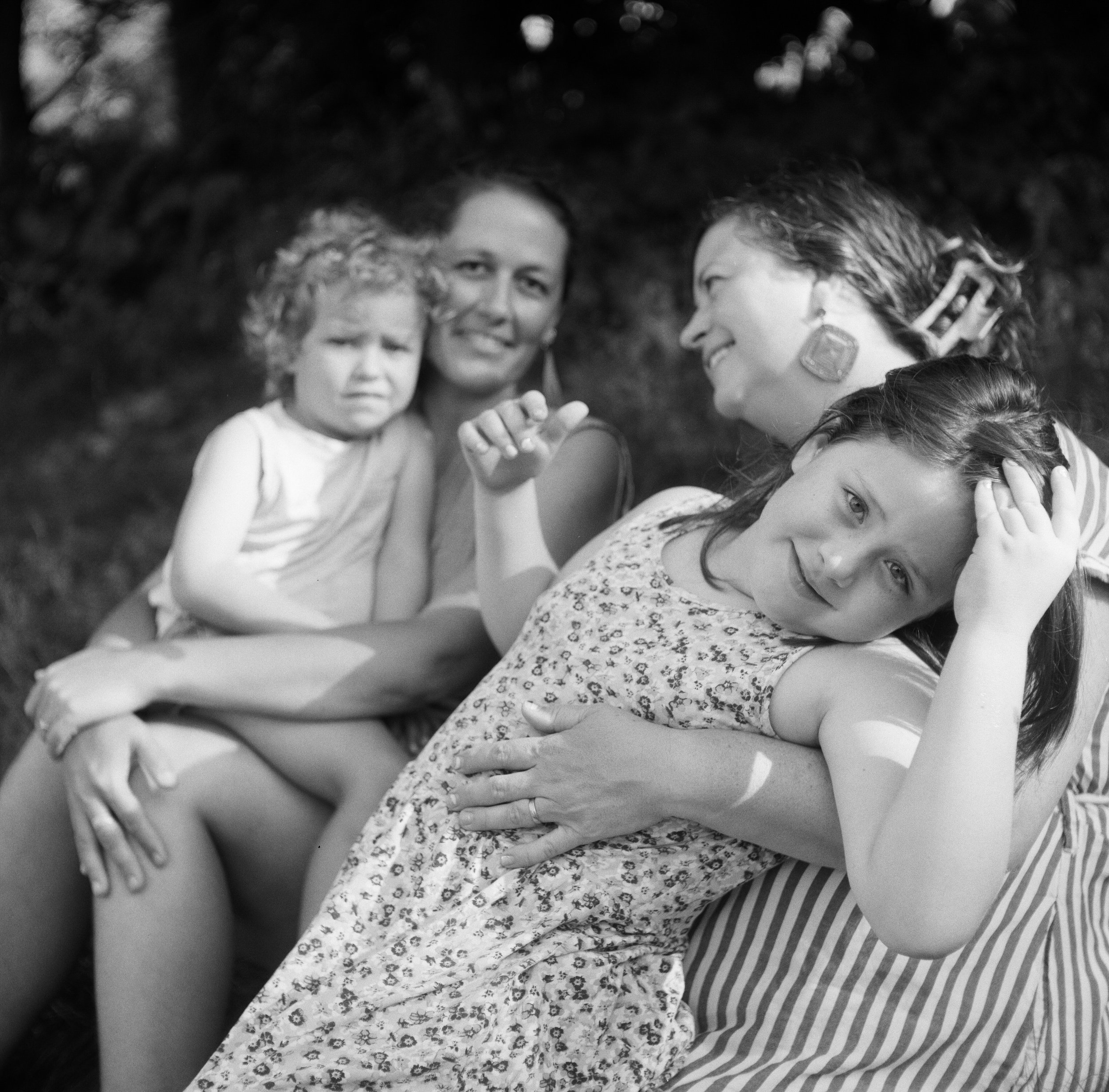 LGBT+ family photography session at home on film in Maine