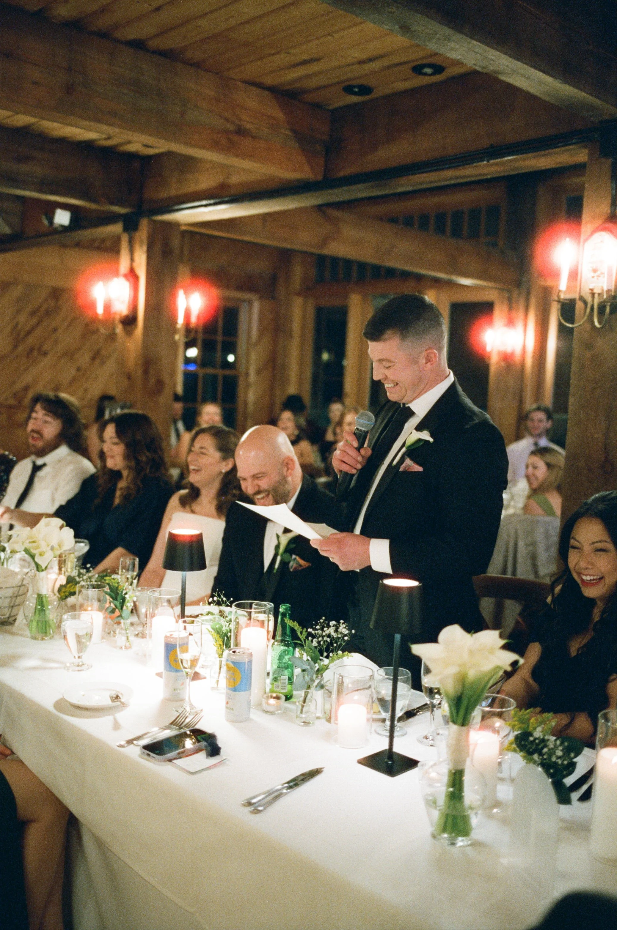 speeches under candlelit at wedding in massachusetts on film
