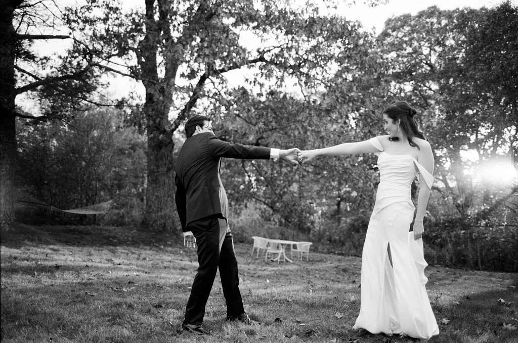Documentary natural portraits of bride and groom on wedding day at tops'l farm in Maine