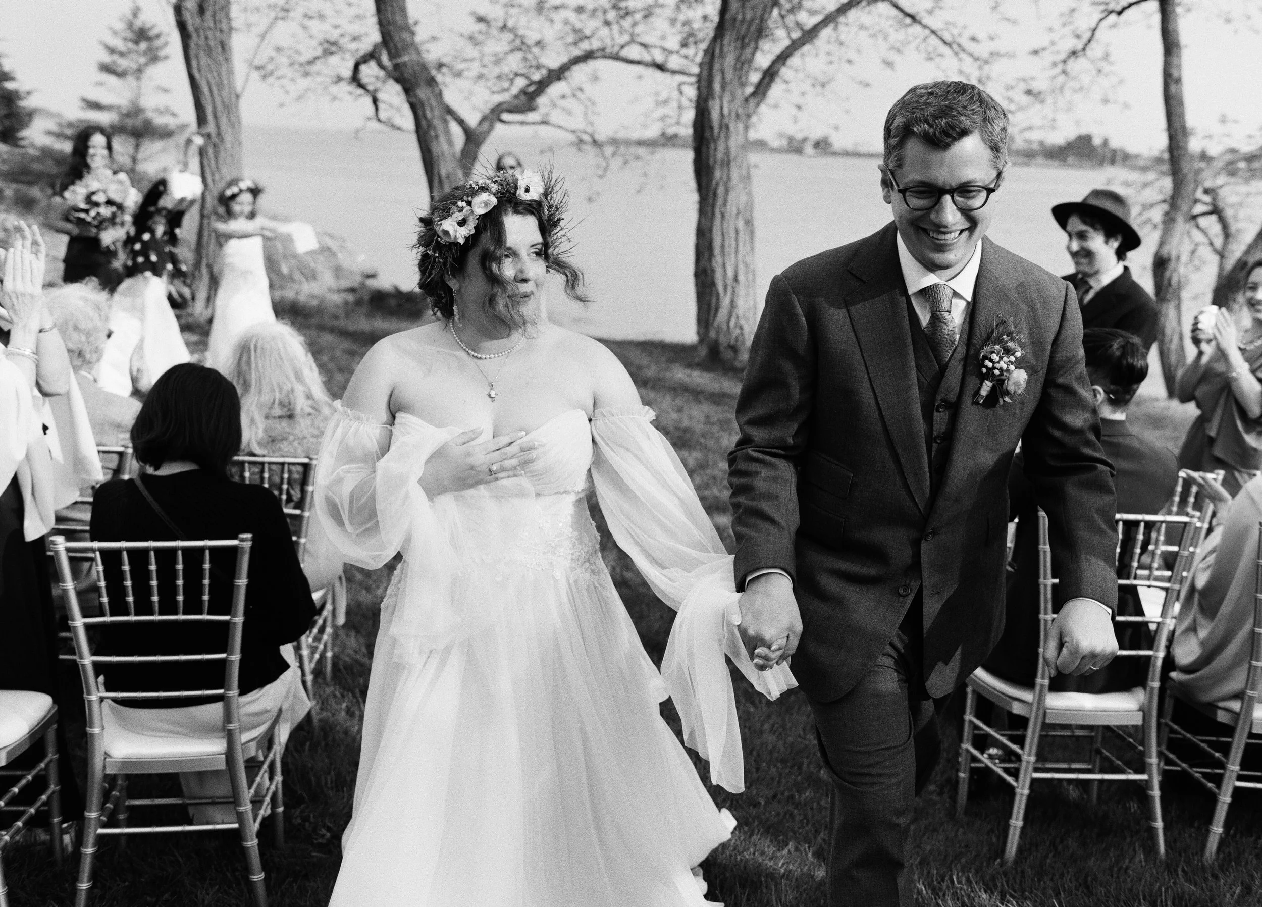 A couple exits their small ceremony at Kittery Point Maine