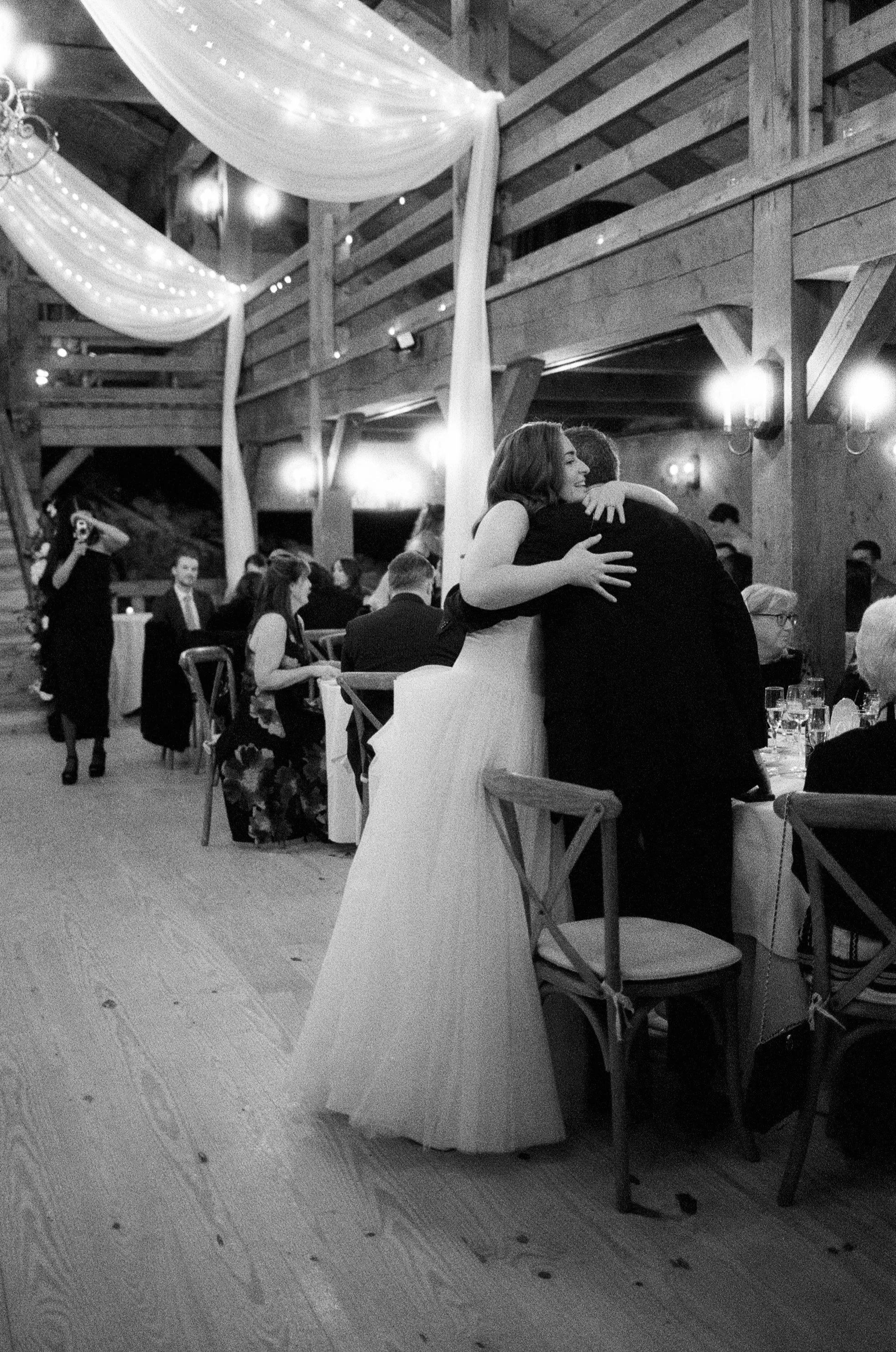 bride hugging dad