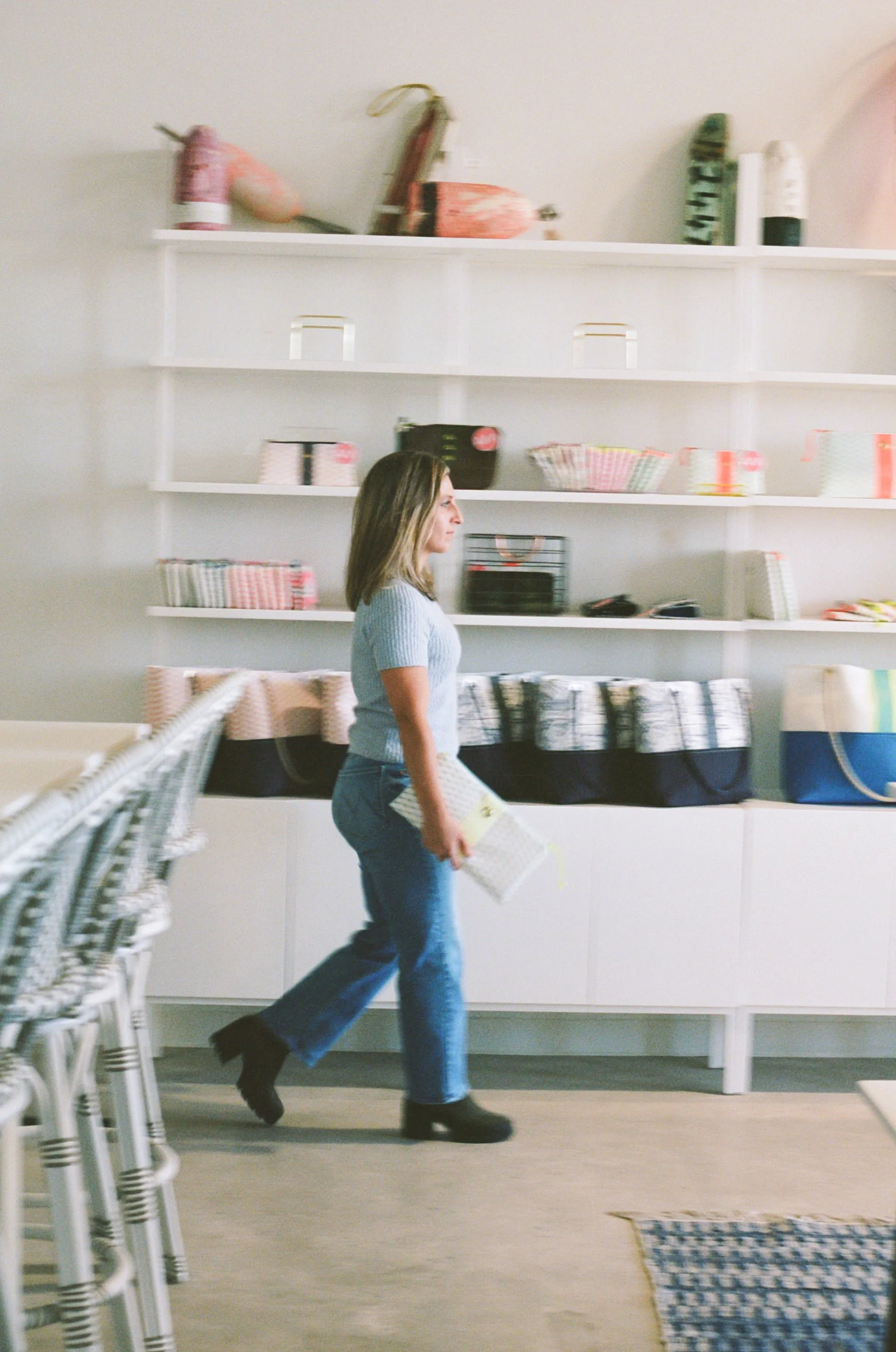 Studio photography for artists and creative in Maine for a bag designer at her storefront