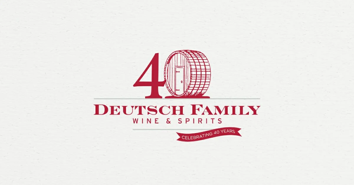 Logo for Deutsch Family Wine & Spirits celebrating 40 years, featuring a stylized wine barrel with a door.
