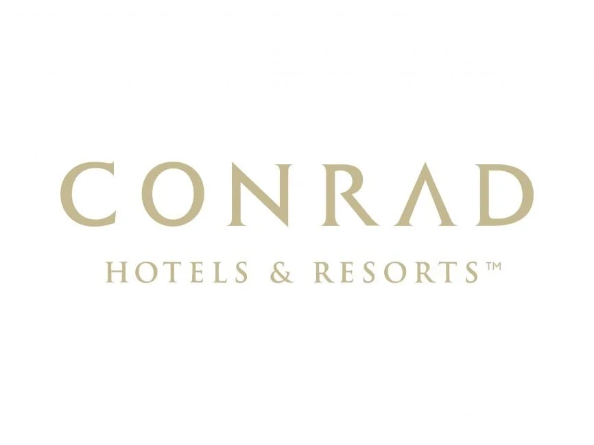 Conrad Hotels & Resorts logo in beige text on a white background.