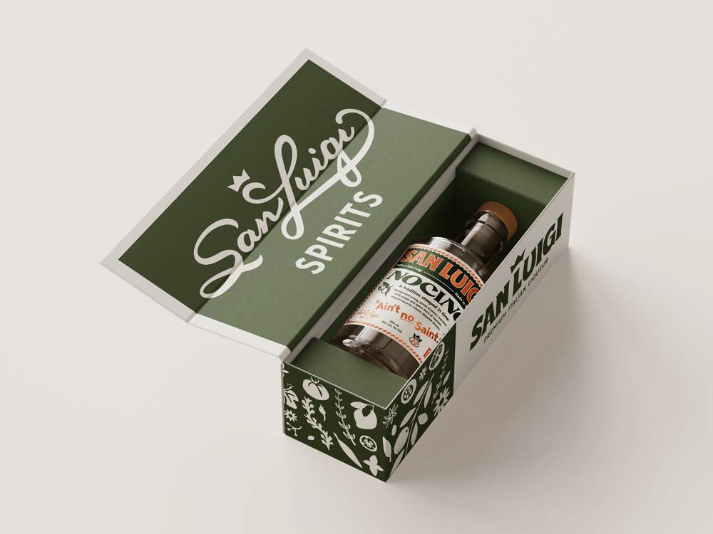 A bottle of San Luigi Nocino in a decorative white and dark green box.
