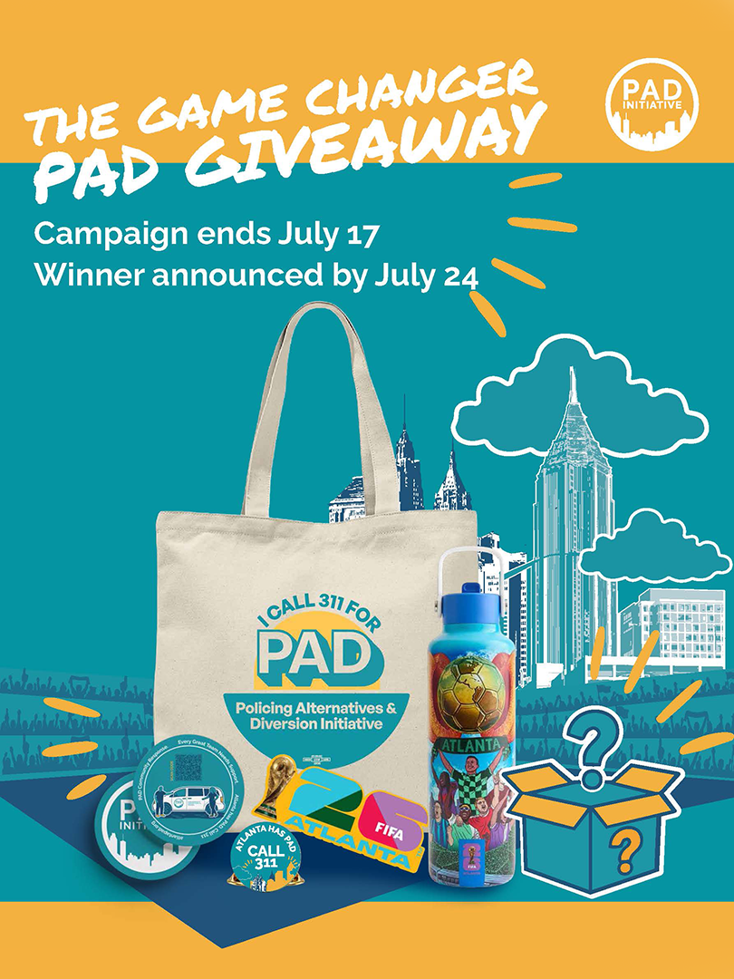 This image shows the prizes for the PAD “The Game Changer” giveaway: a FIFA World Cup Atlanta pin, an exclusive Atlanta water bottle, a PAD tote bag, PAD coasters from the campaign, and a mystery item.