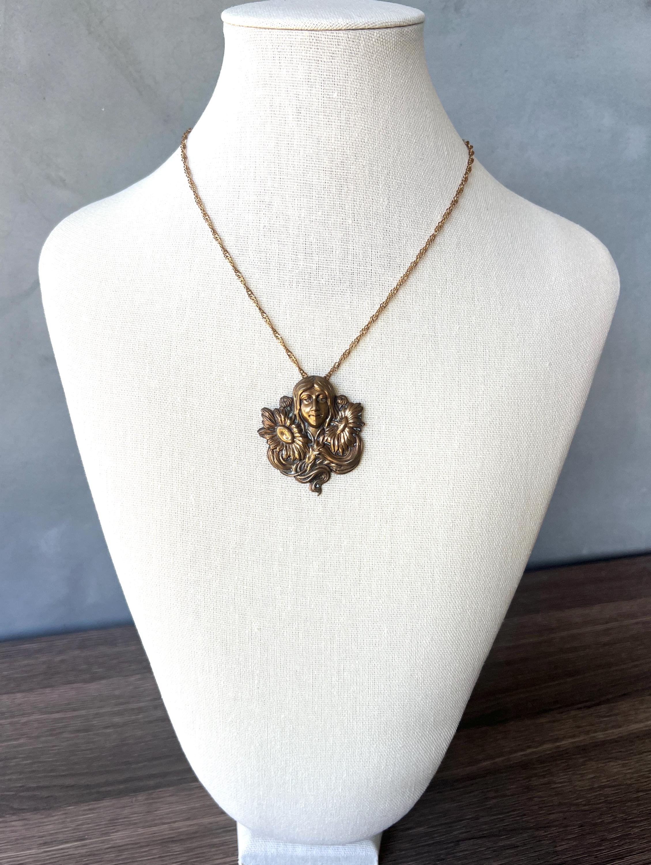 art nouveau repousse flower lady