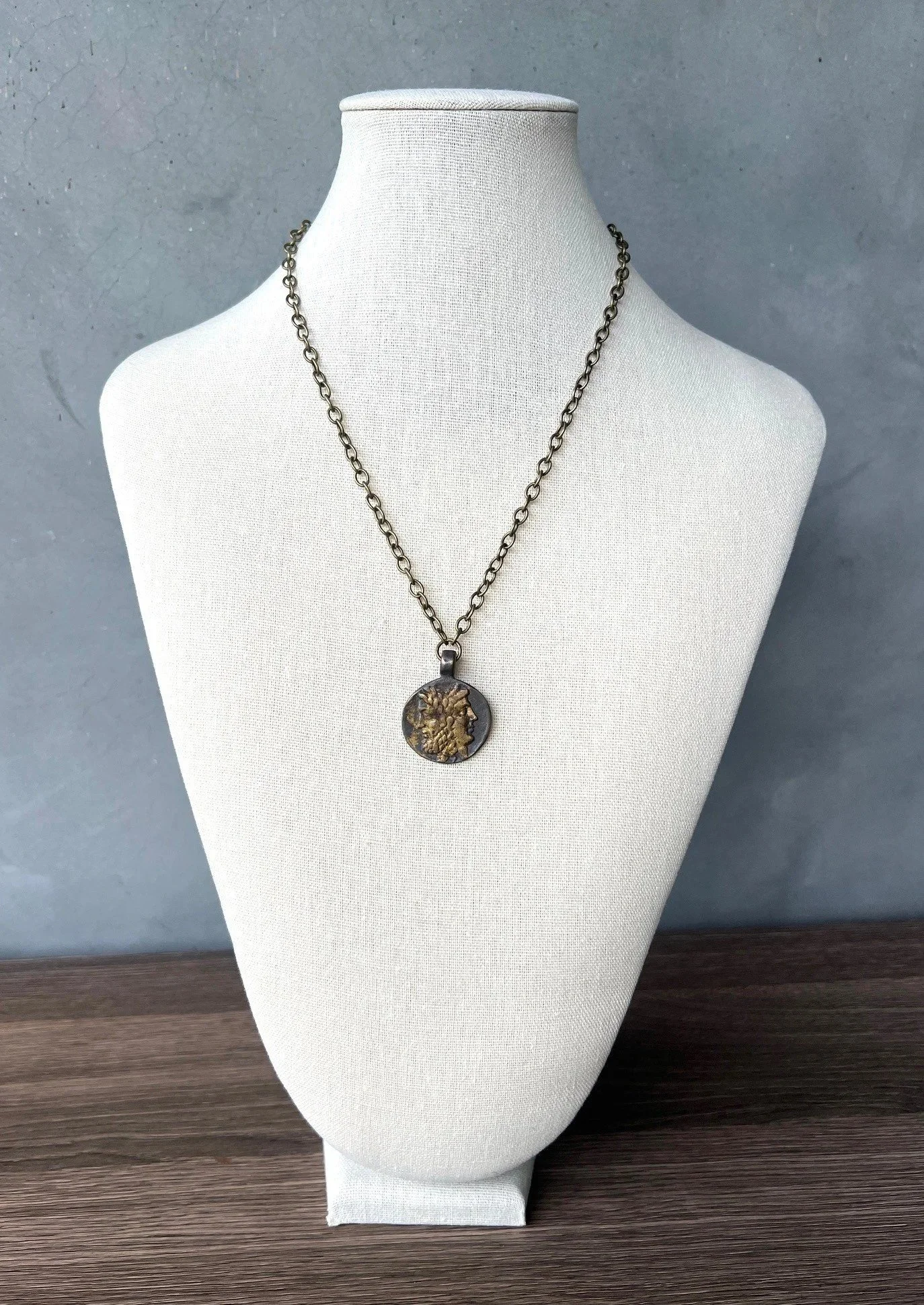 janus coin replica necklace