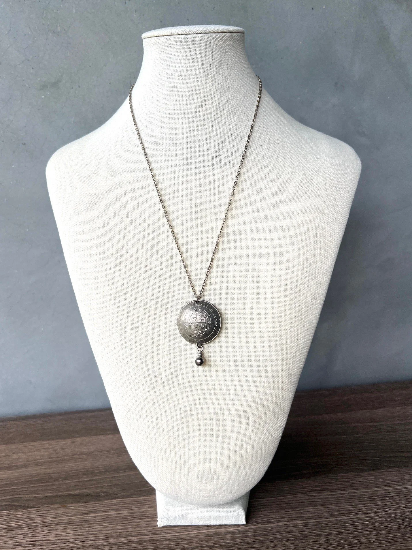 peruvian coin and pearl necklace