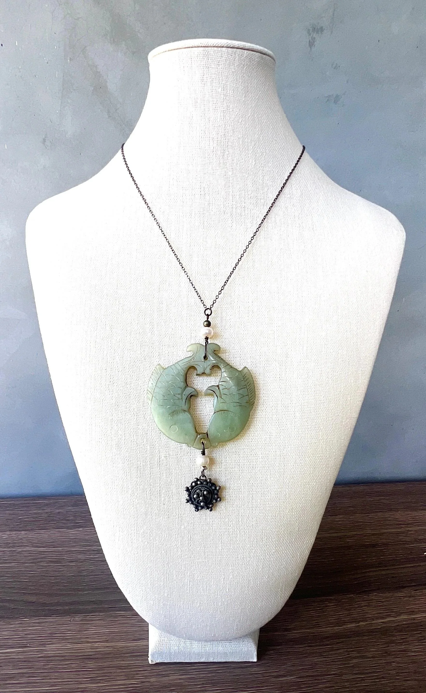 jade pisces amulet with pearls