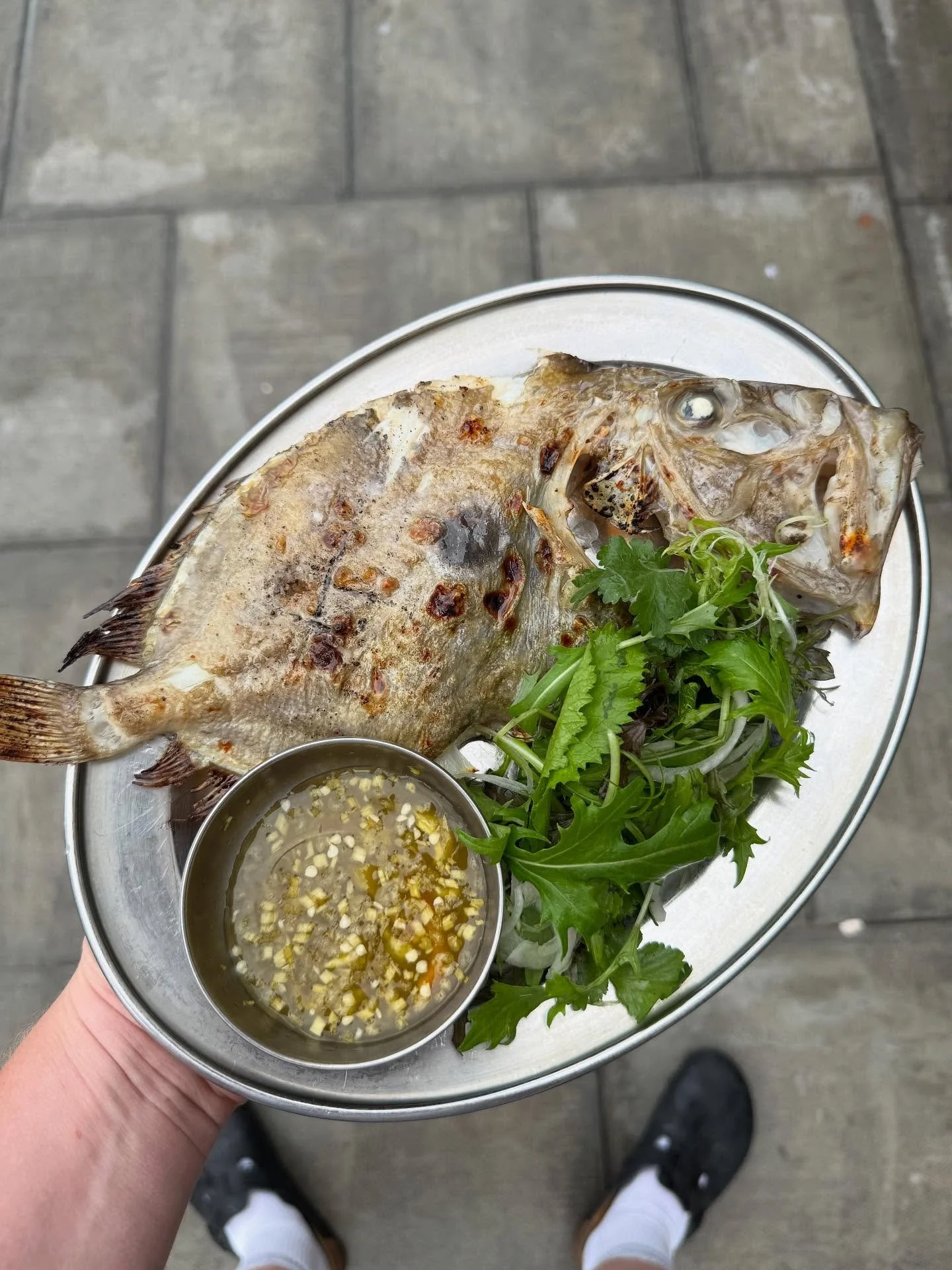 We have some beautiful John Dory from @glenmarseafood on the menu this weekend. 

Grilled over coals with a touch of Calamansi vinegar as it cooks turning gently. 

Served with a Calamansi prik nam som (chilli vinegar) and @abercornfarm leaves.