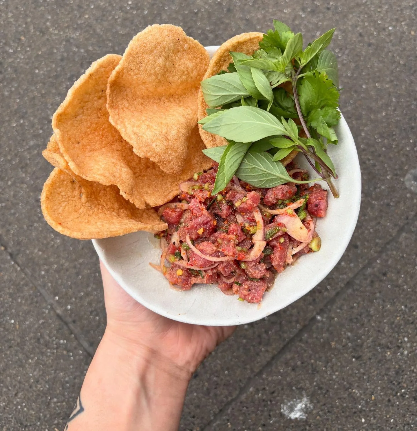 Raw dishes were the thing we were amazed by the most from our travels in Thailand. With the colder months coming in now and our menu shifting into the likes of smoked venison massaman with roti, this raw beef larb provides balance to the menu. 

Hand