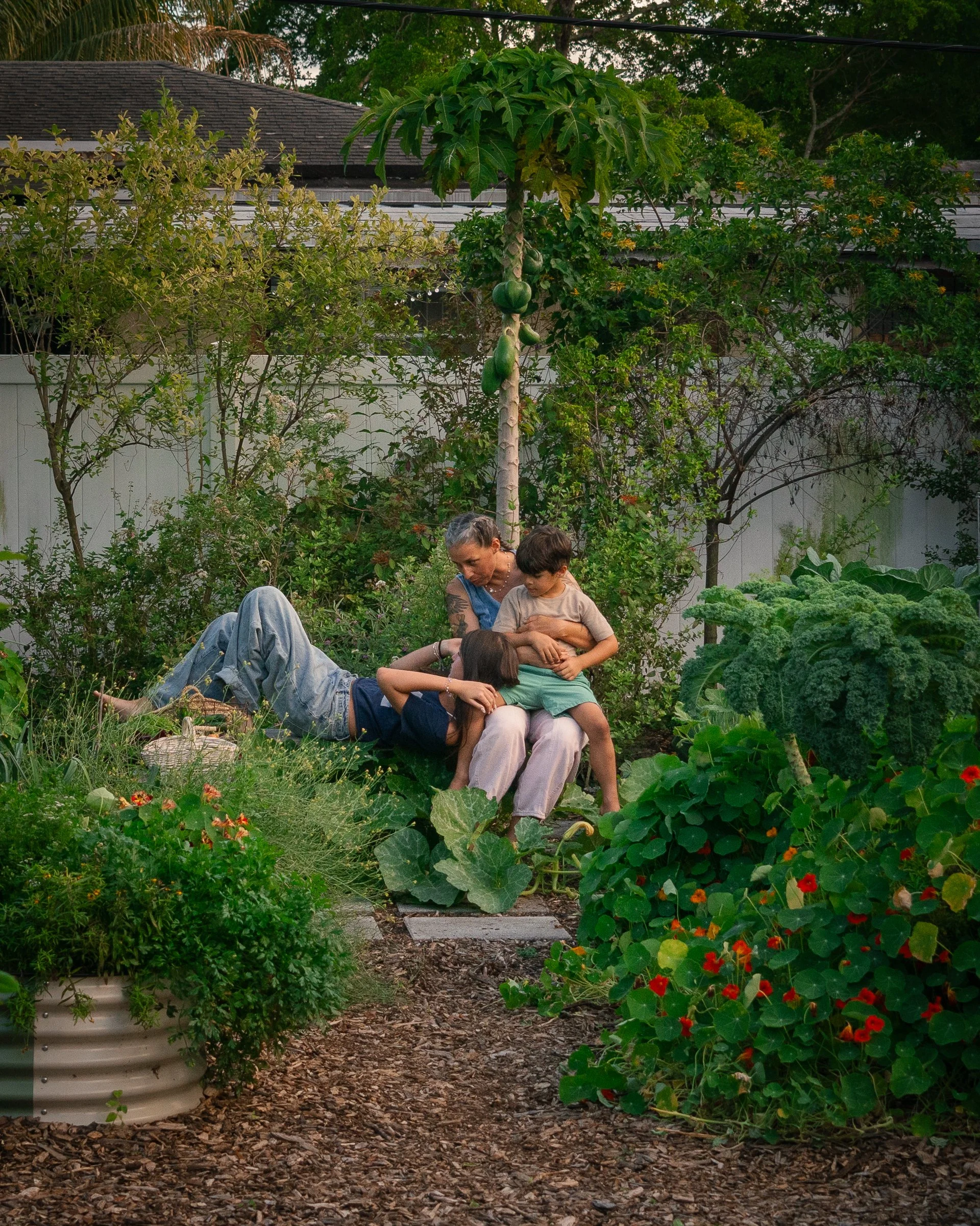 garden-design-kitchen-garden-miami-family-friendly-seating-area.jpg